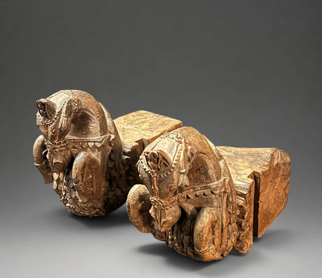 MAGNIFICENT PAIR OF INDIAL MUGHAL FINISHINGS IN SANDALWOOD, EARLY
