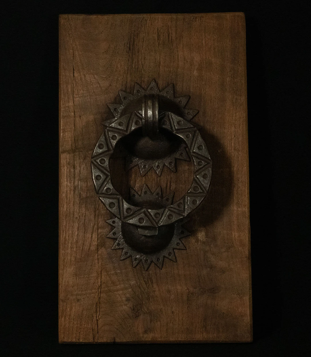 Mudejar wrought iron door knocker with oak wood support