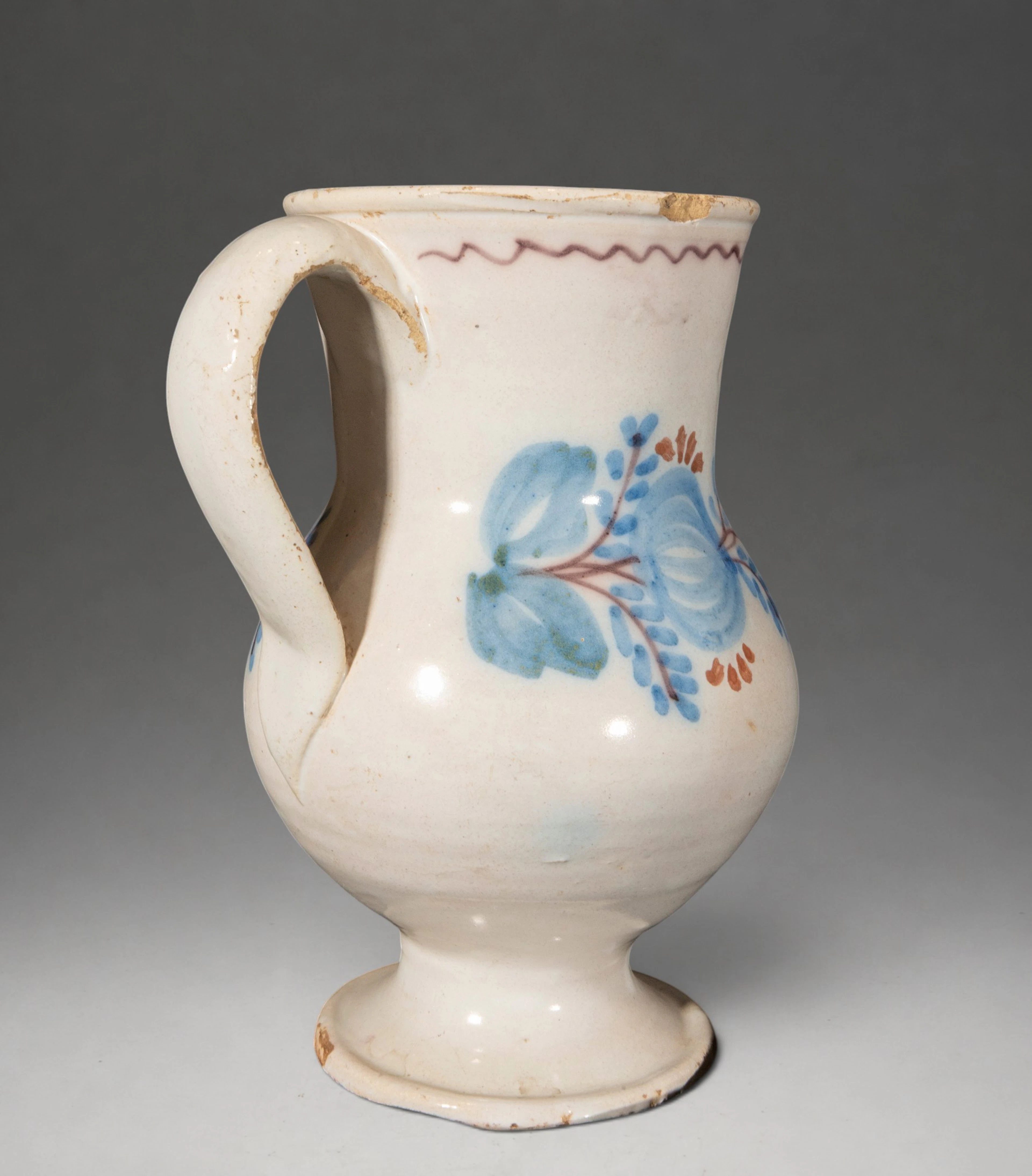 MANISES CERAMICS - Jug with polychrome floral bouquet