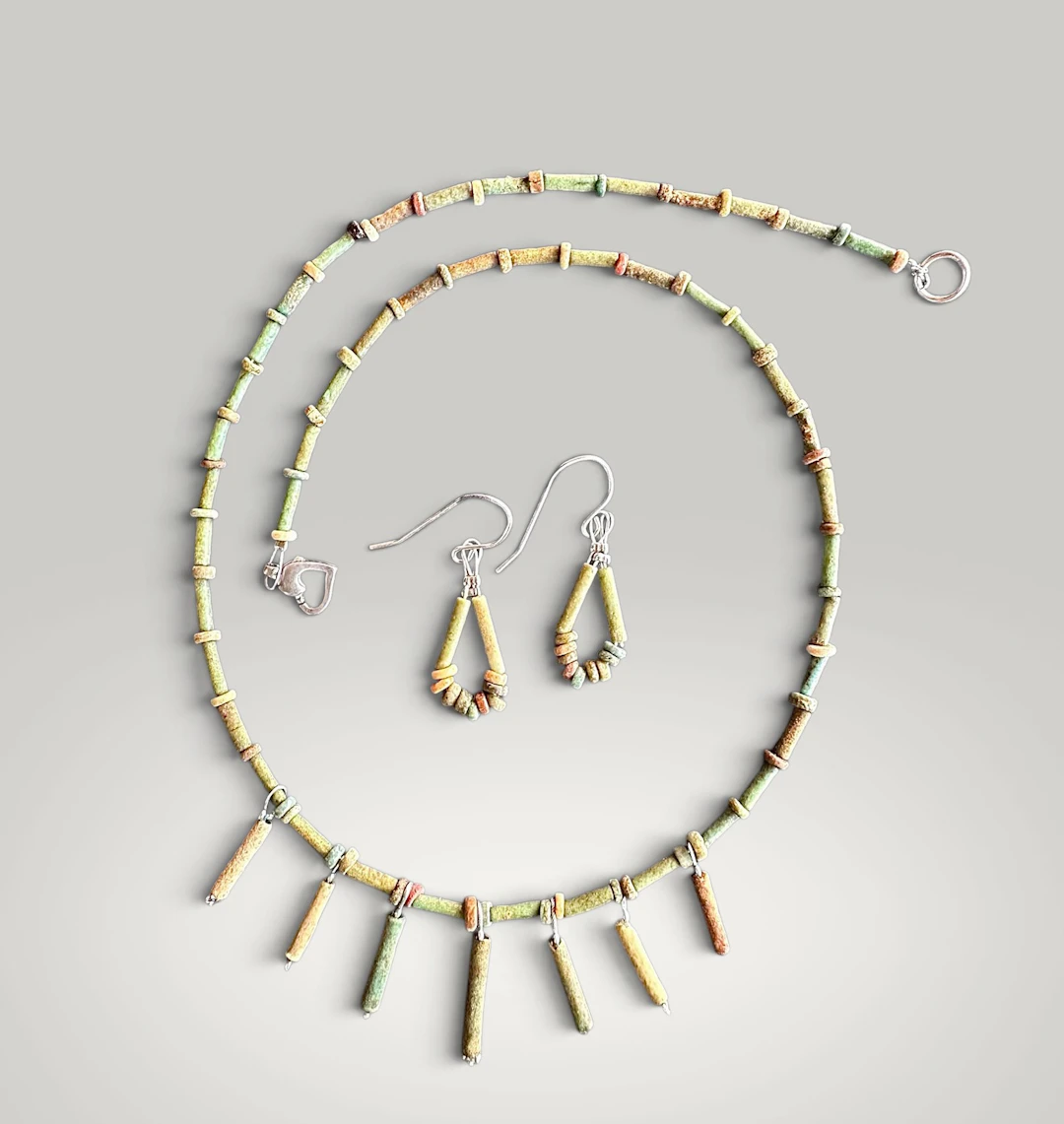 Set of necklace and earrings made of ancient Egyptian faience beads.