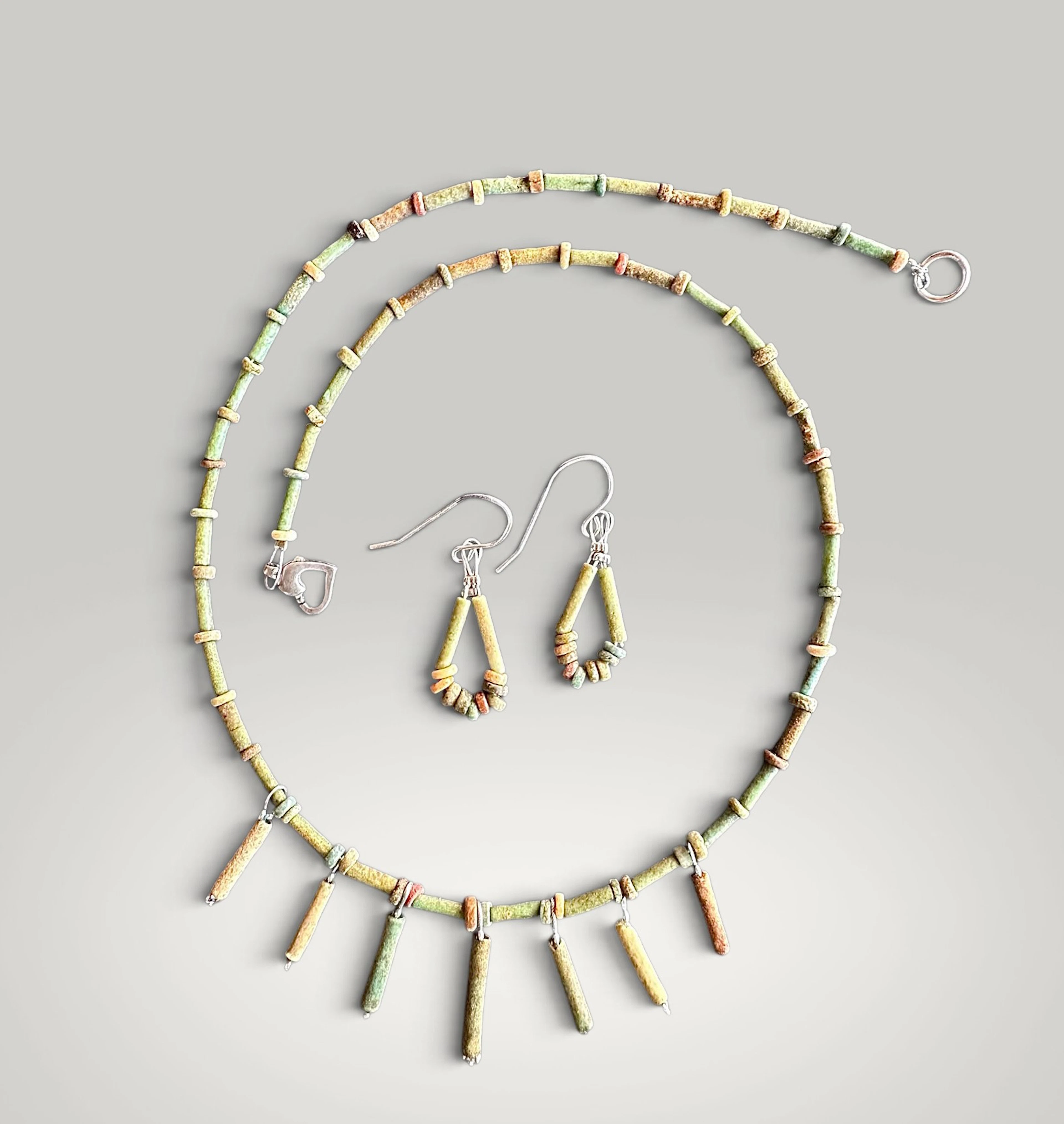 Set of necklace and earrings made of ancient Egyptian faience beads.