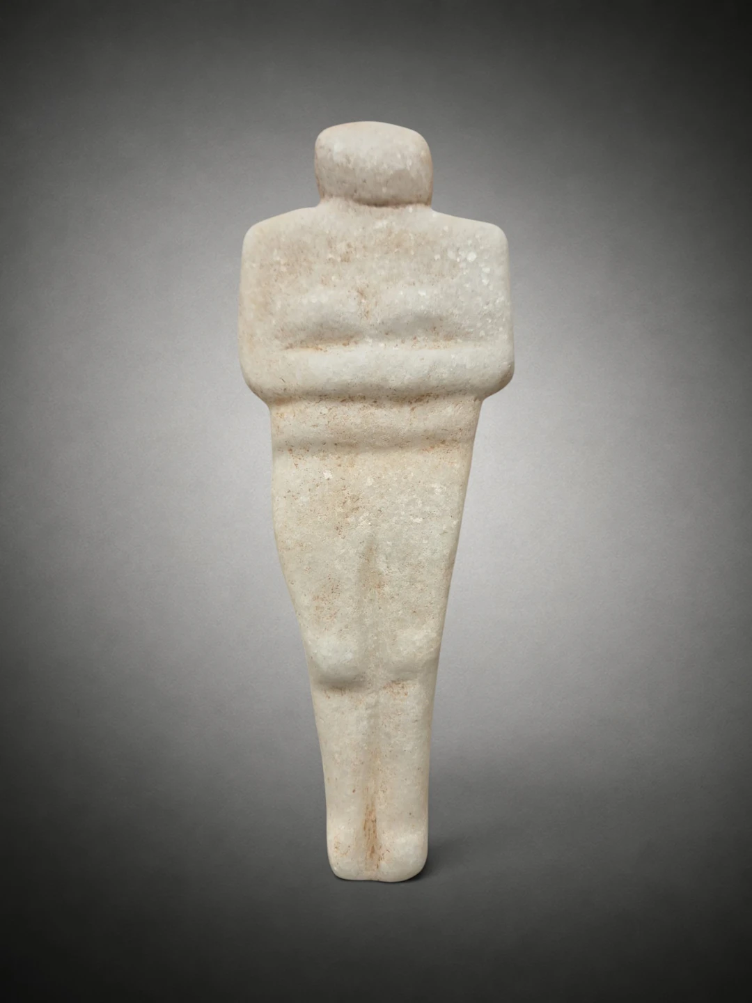 Neolithic steatopygous female figure in white marble, Eastern Europe