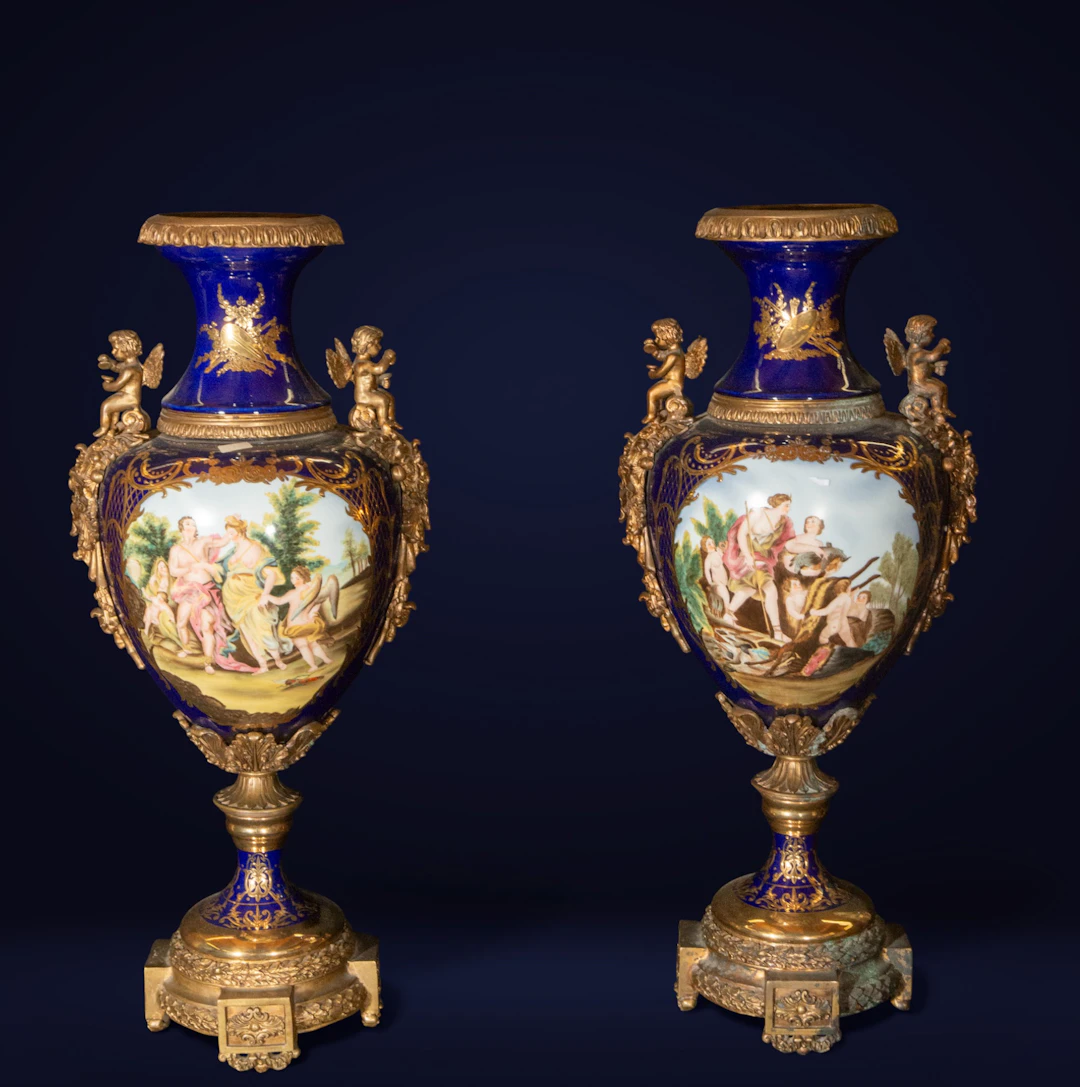 Pair of porcelain and gilt bronze vases. French School. 20th century.