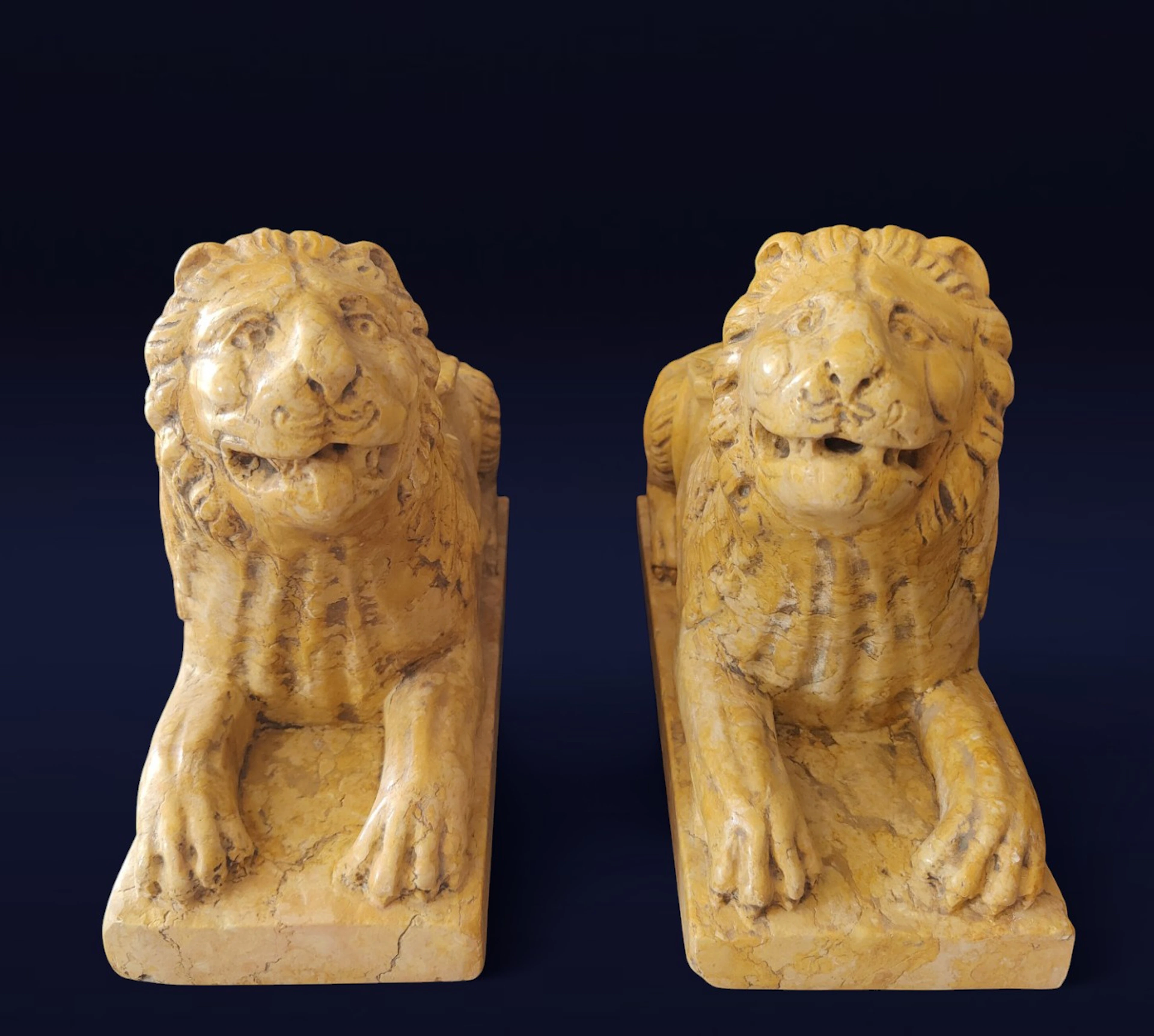 Spectacular pair of lions in Italian Romanesque style in yellow marble