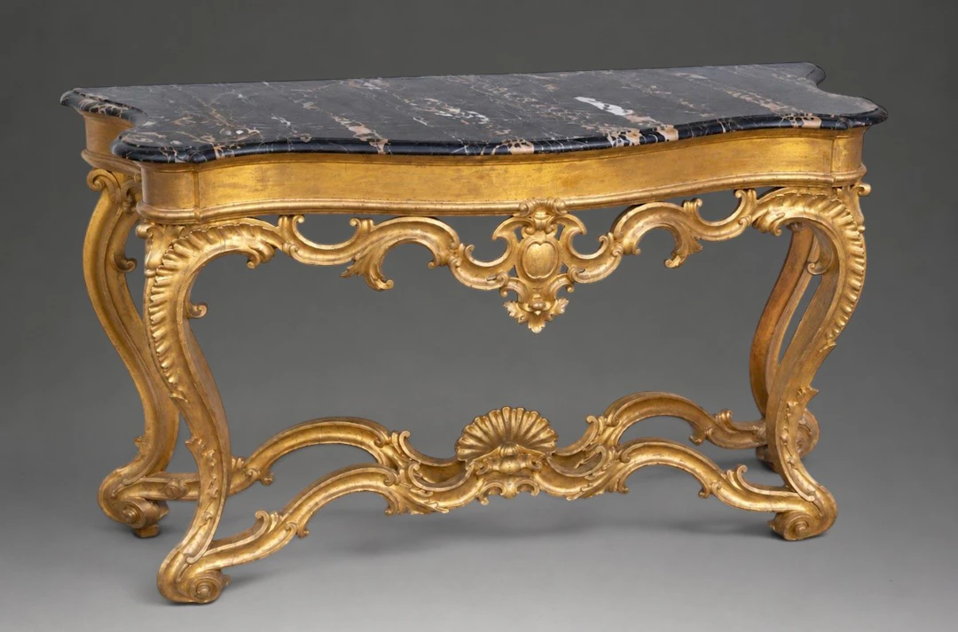 Roman console table in carved and gilded wood with a Nero Portoro