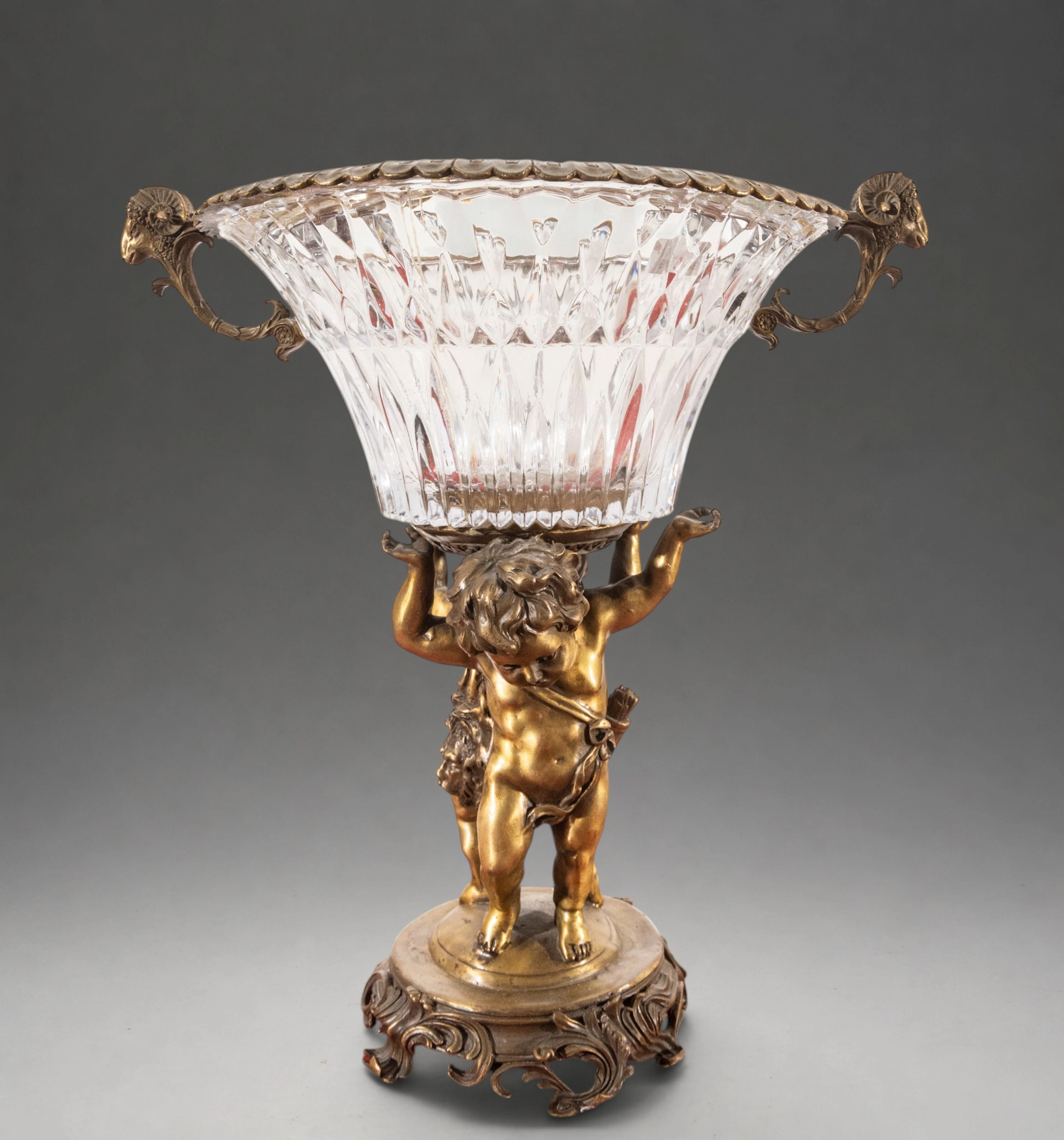French centerpiece with Baccarat crystal goblet and putto figurine