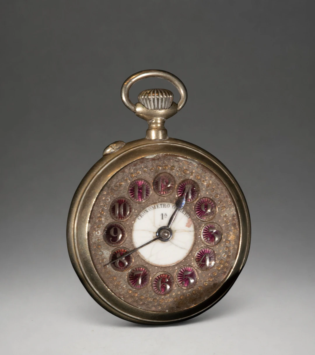 Pocket watch with ornamental dial and Arabic numerals