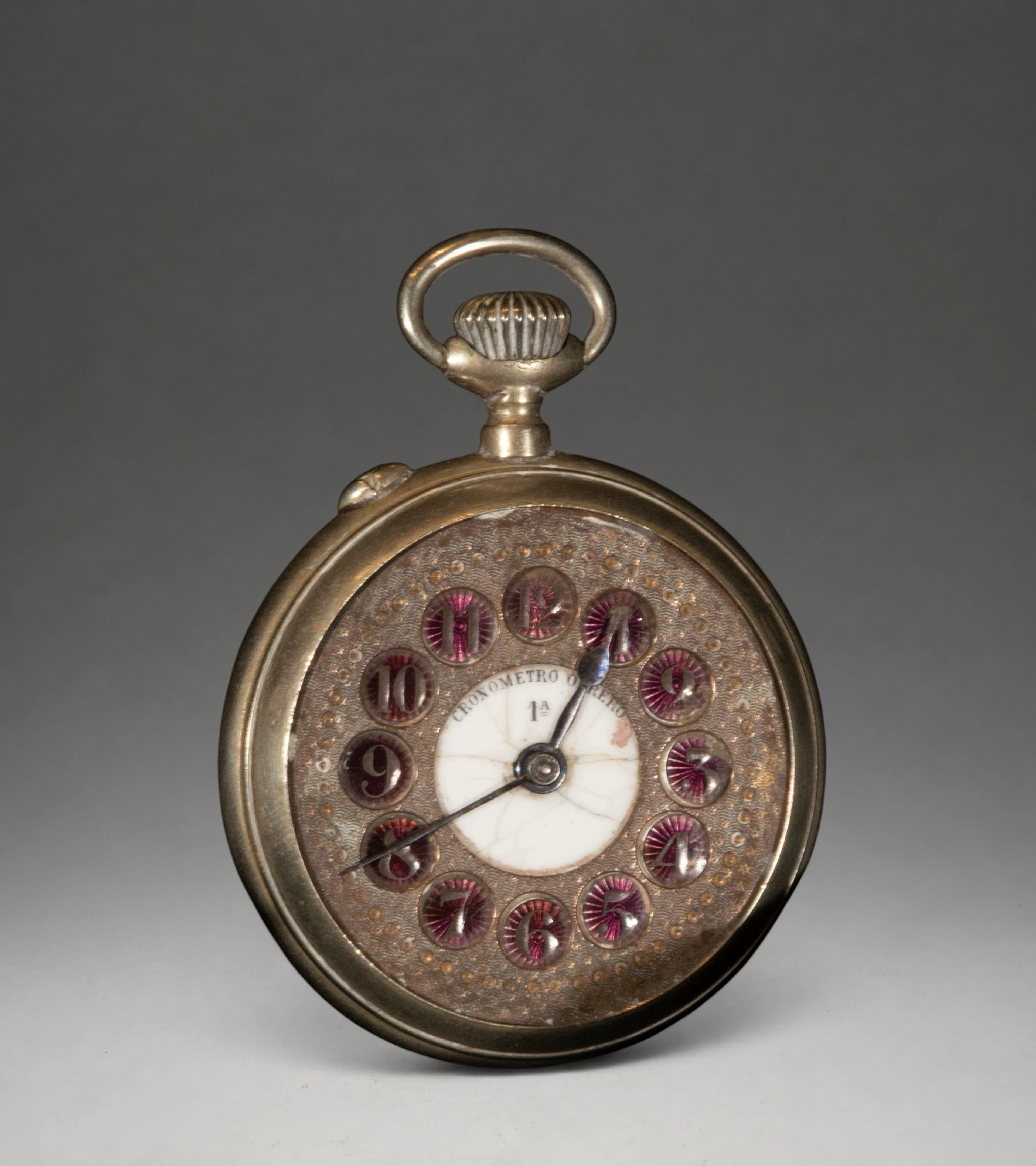 Pocket watch with ornamental dial and Arabic numerals