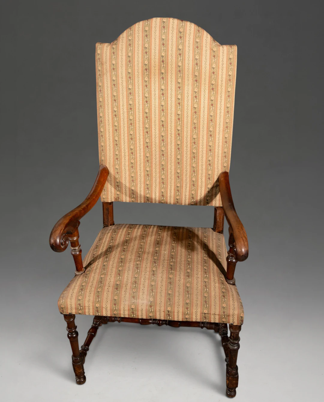 Upholstered walnut armchair – 17th century