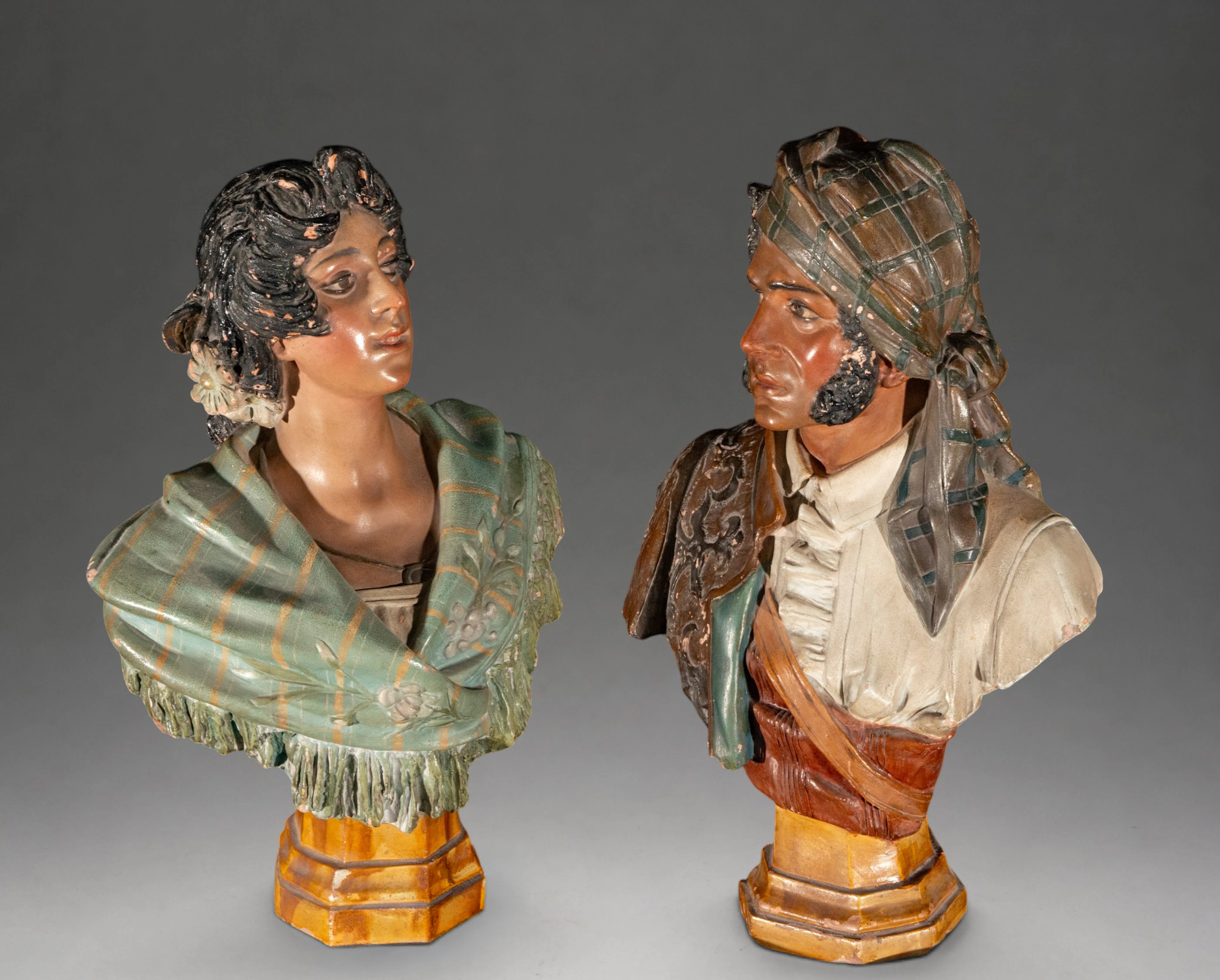 Pair of genre busts – Spanish School – 20th century