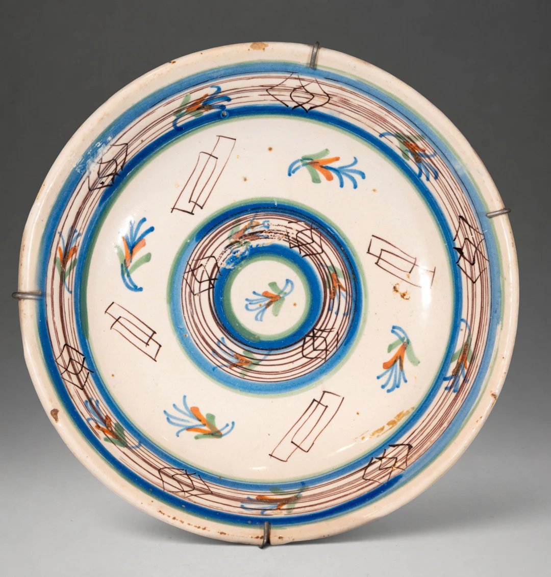MANISES CERAMICS - Plate with polychrome geometric and vegetal decoration
