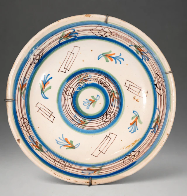 MANISES CERAMICS - Plate with polychrome geometric and vegetal decoration
