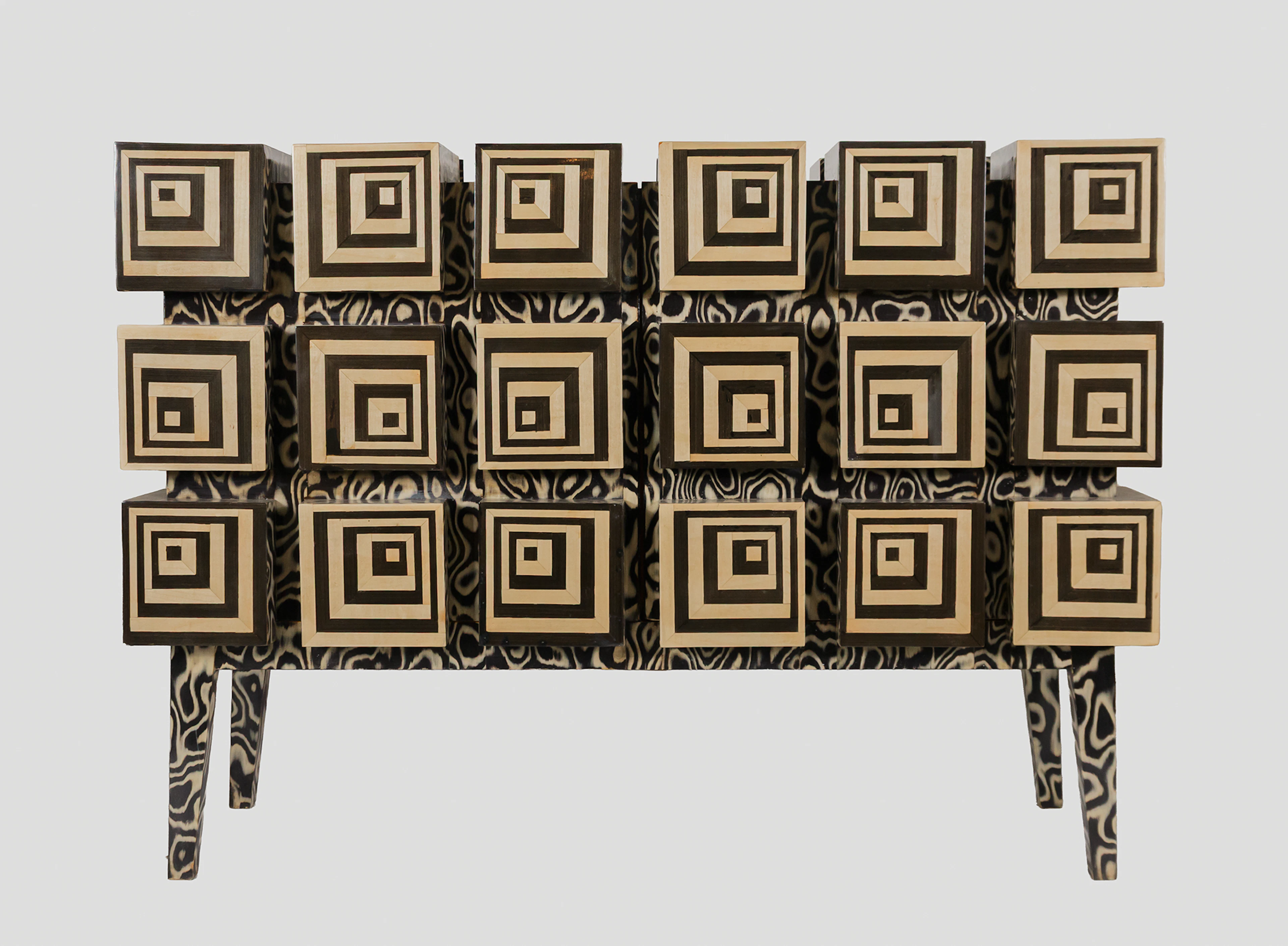 Sideboard in black and white lacquered wood with cubic coffering. 20th century