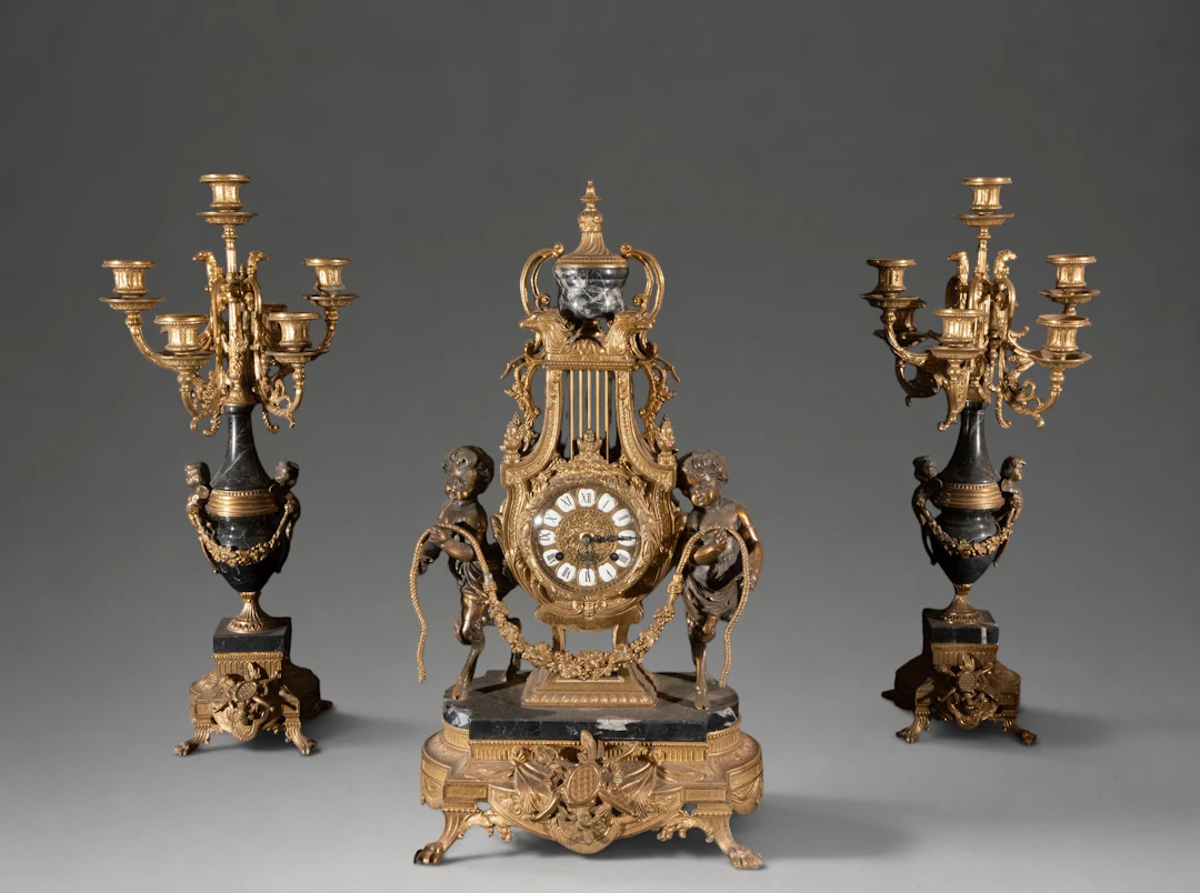 Set of large Napoleon III clock and pair of Ormolu candlesticks –