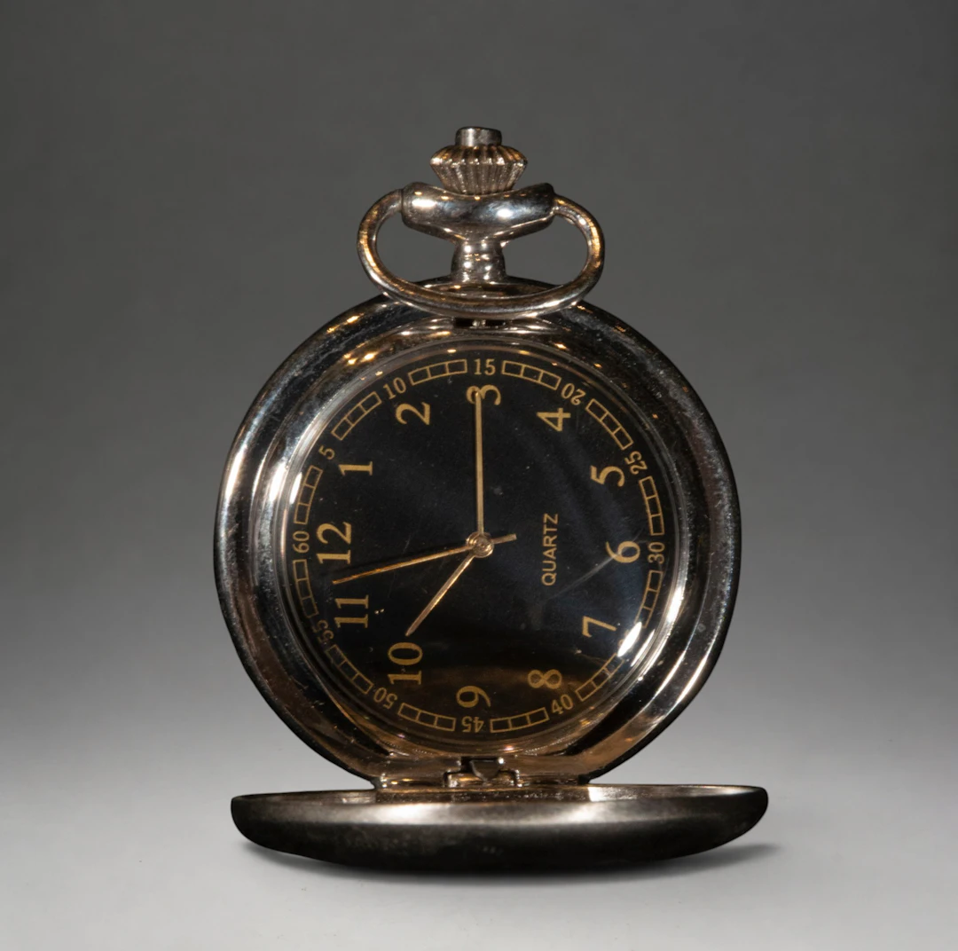 Pocket watch with black dial and Arabic numerals