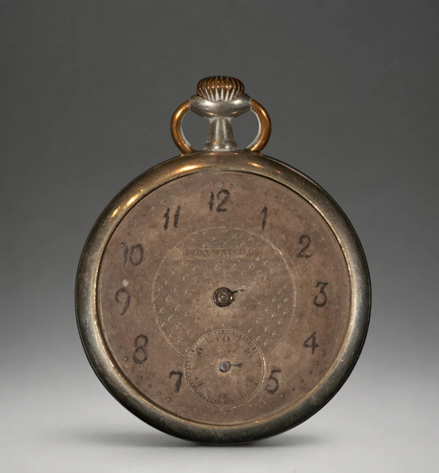 Pocket watch with Arabic numerals and silver case