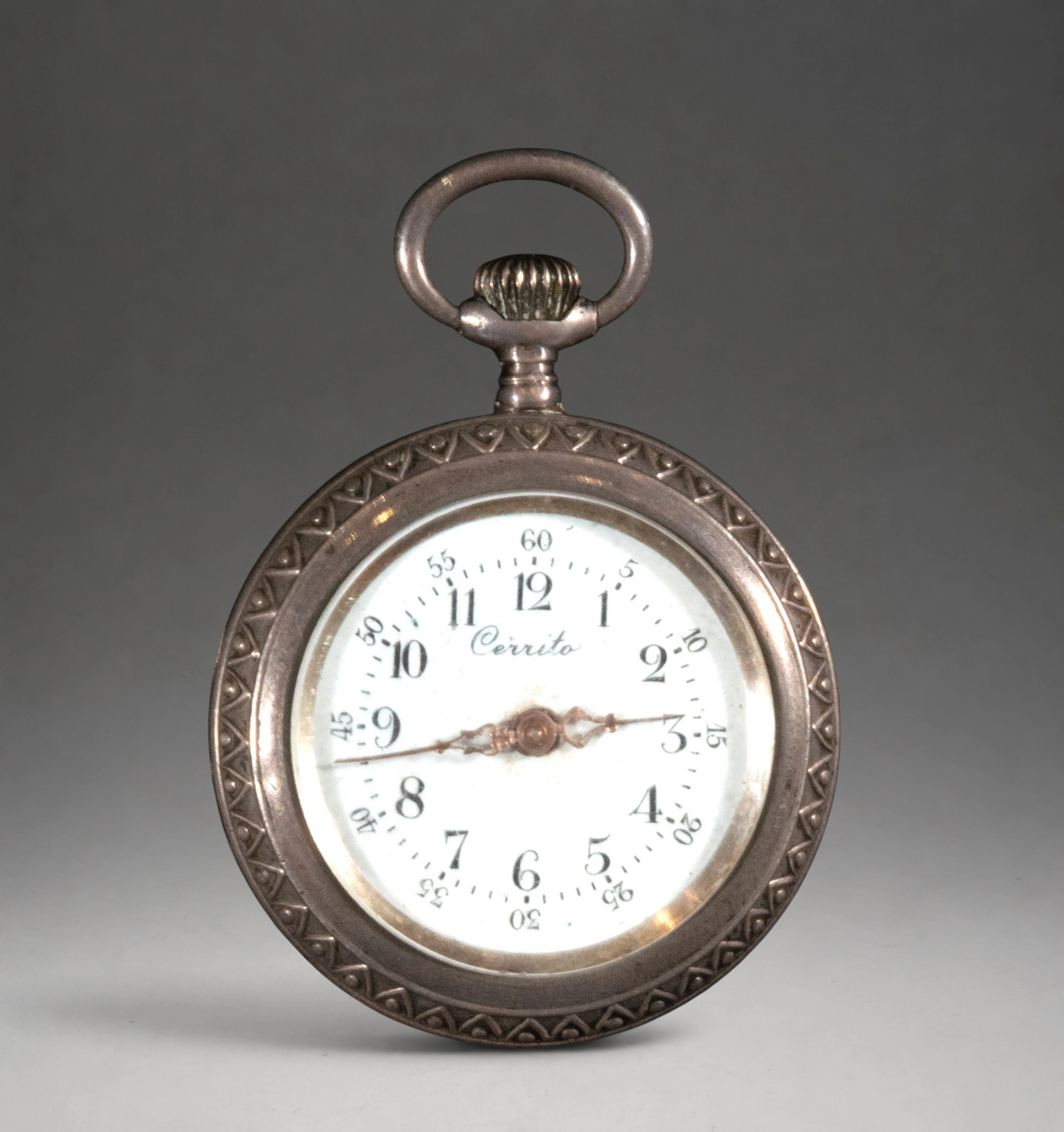 Miniature pocket watch with engraved case