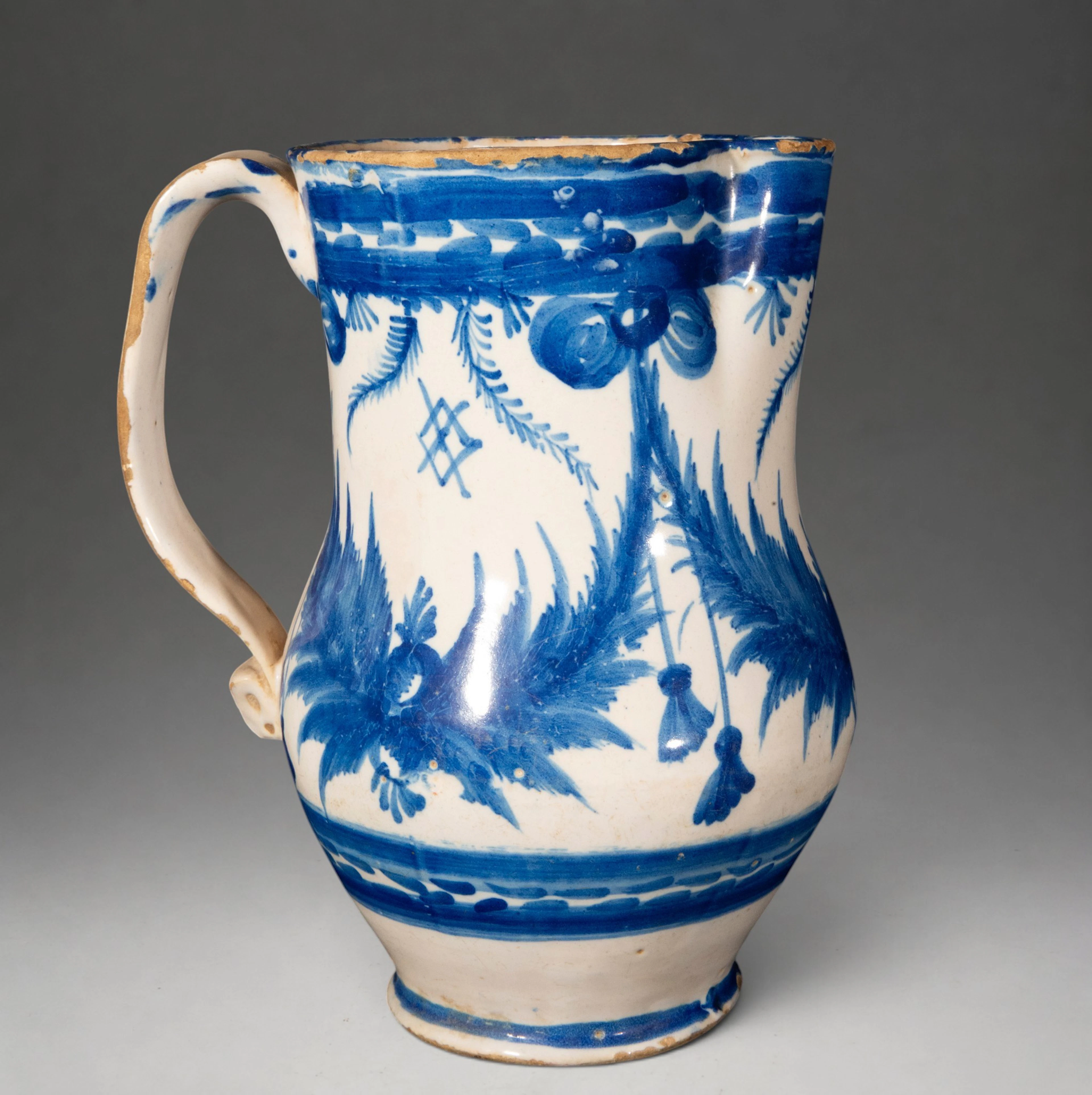 MANISES CERAMICS - Pitcher with plant decoration in cobalt blue