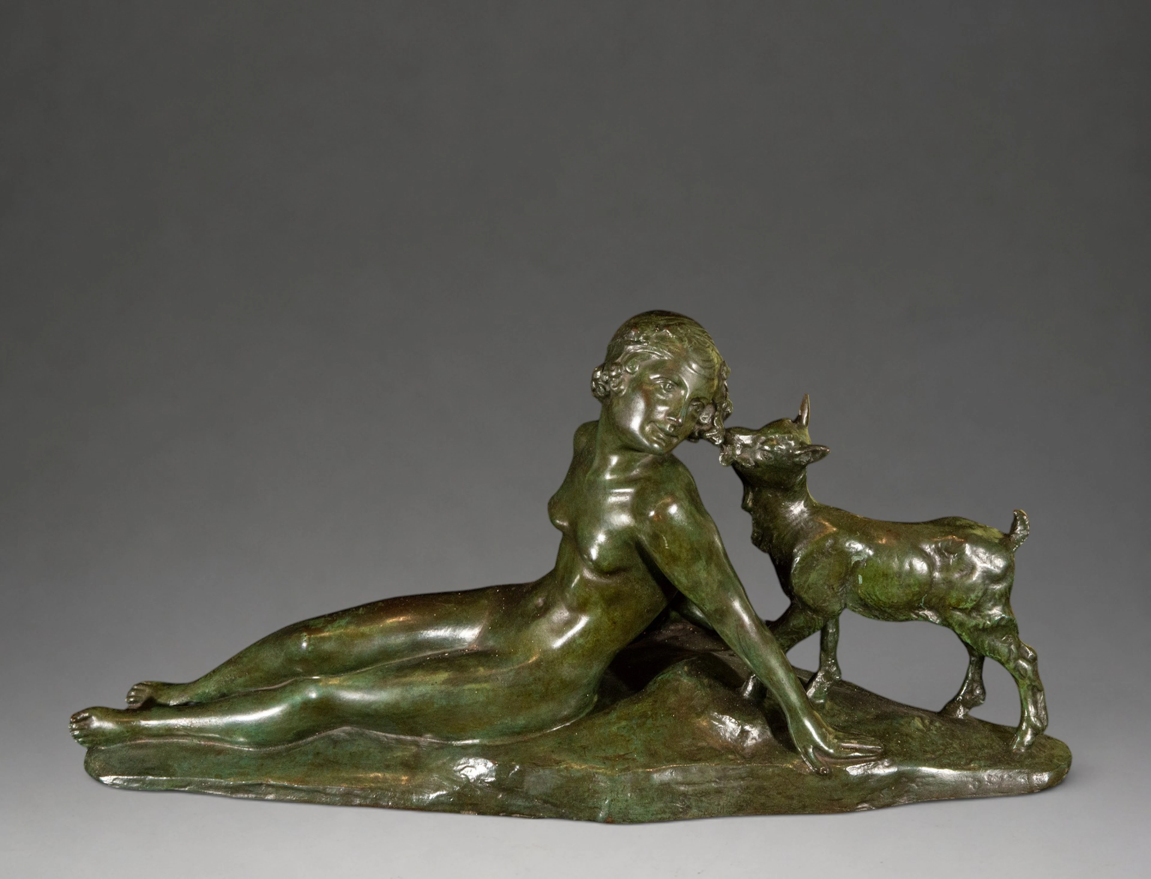 Reclining female nude next to a goat – European Art Deco school – 20th century