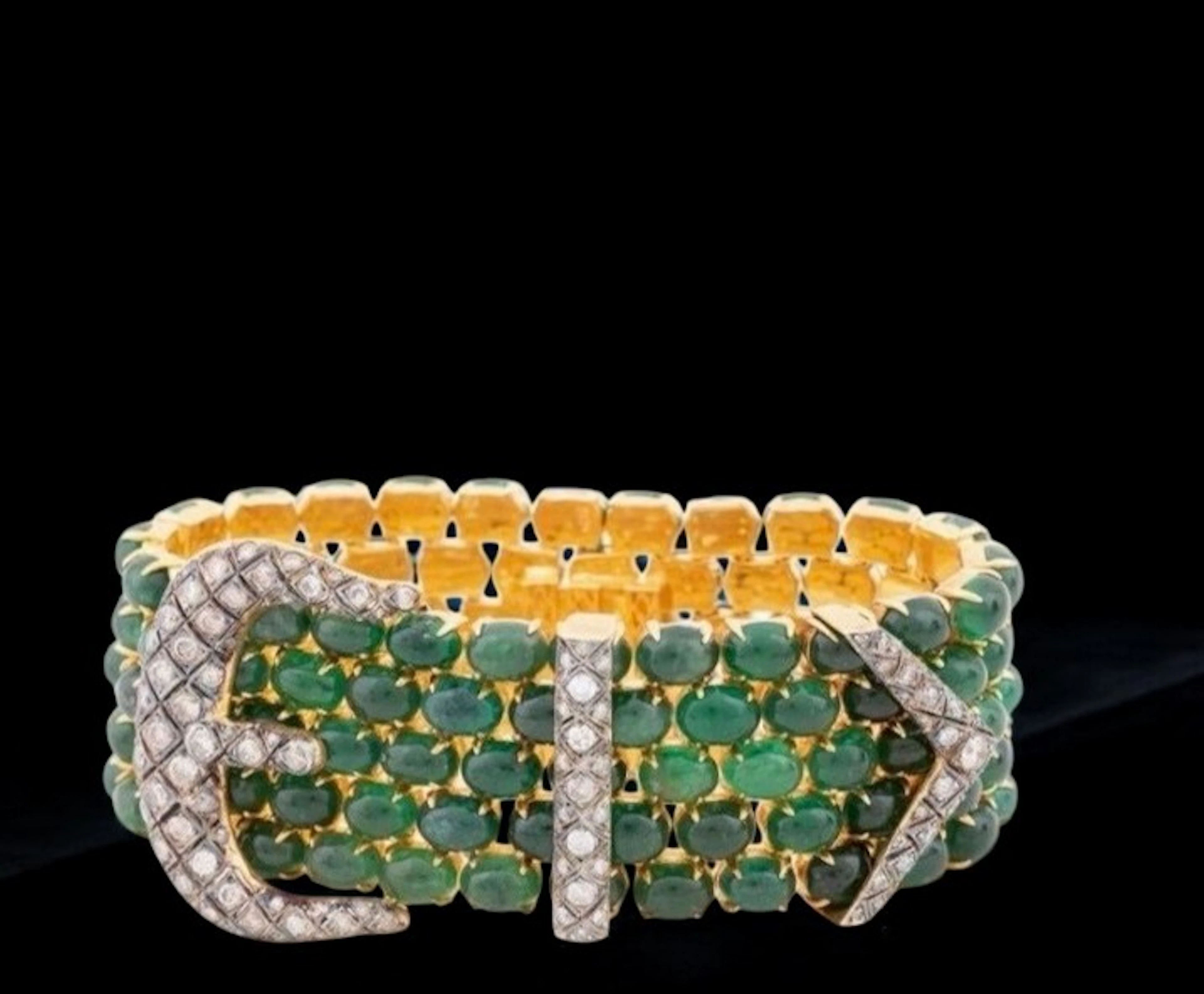 Wide bracelet of emeralds and diamonds