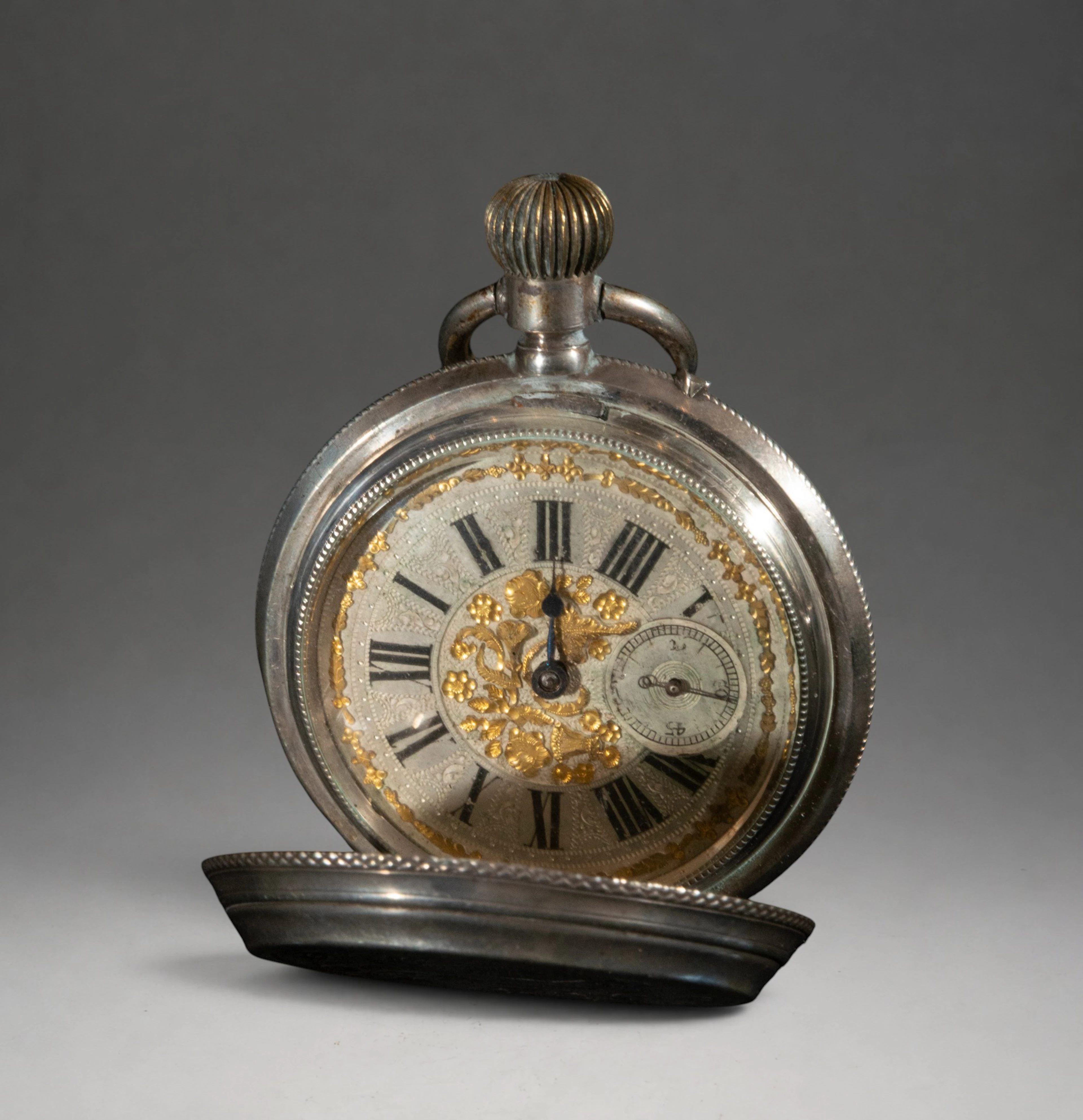 Pocket watch with visible mechanism