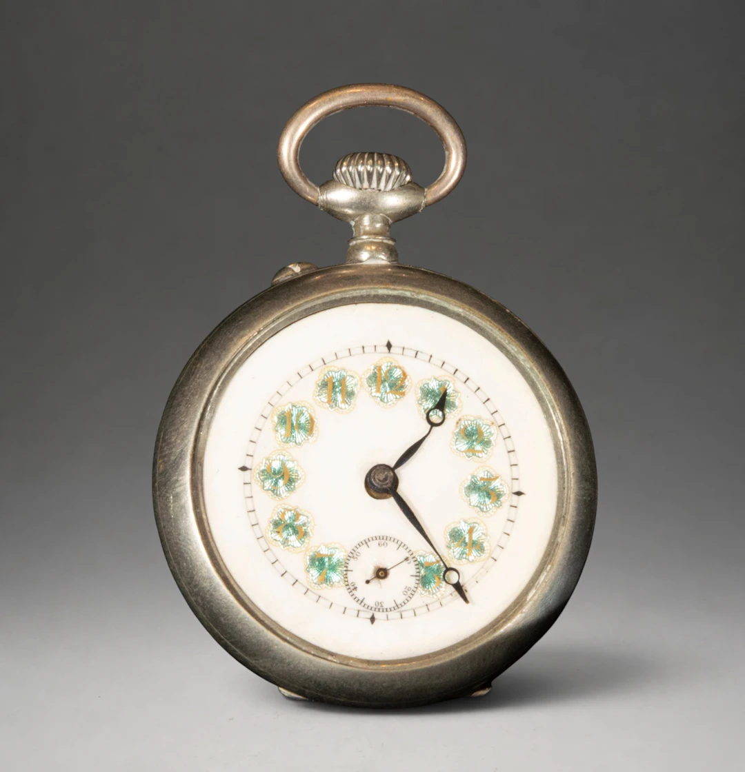 Pocket watch with white dial and Roman numerals