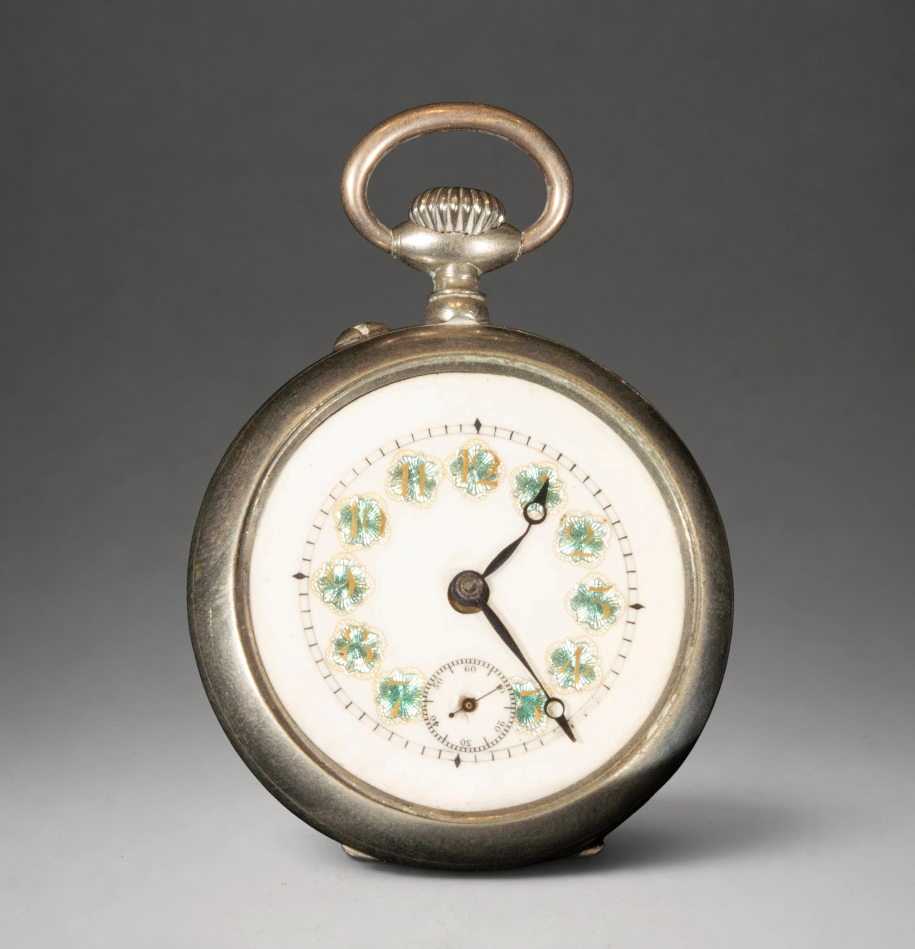 Pocket watch with white dial and Roman numerals
