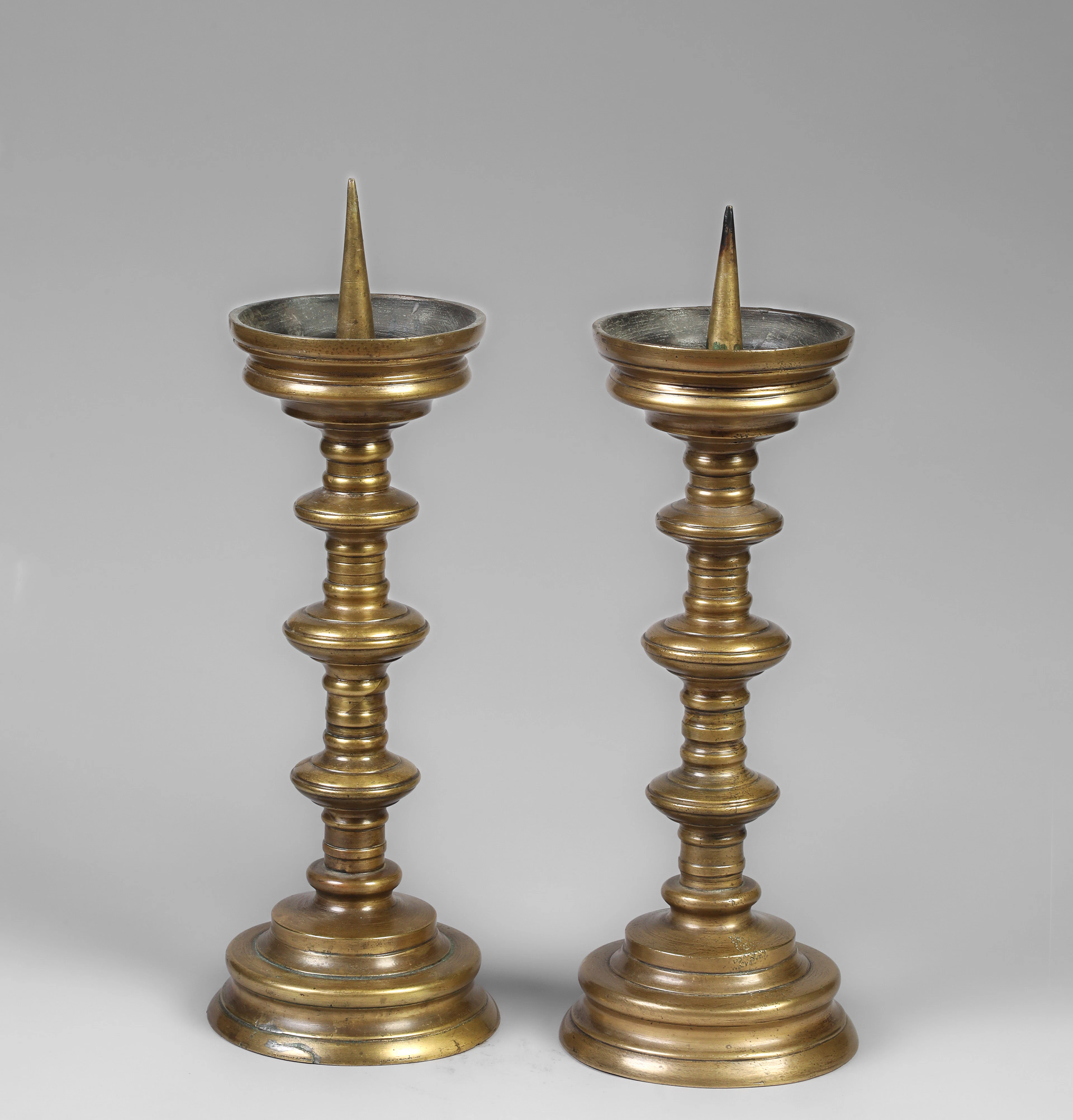 Pair of large German bronze candlesticks. Europe, 17th century