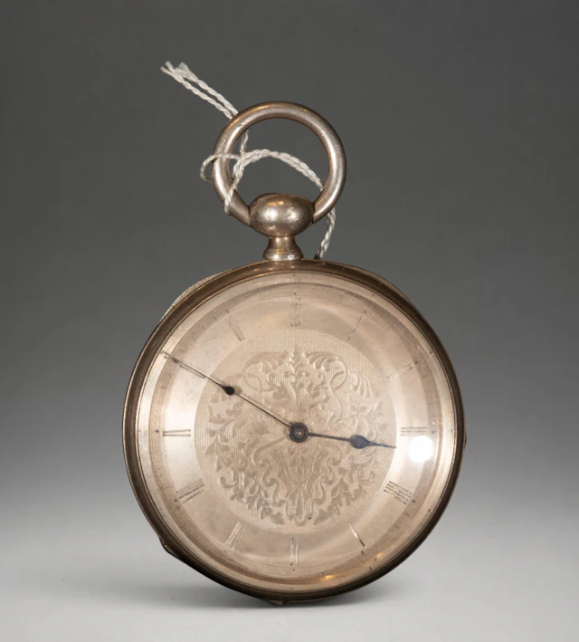 Pocket watch with decorated dial and Roman numerals