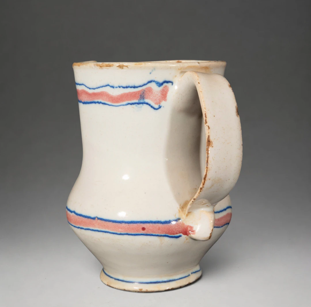 MANISES CERAMICS - Jug with blue and red border decoration
