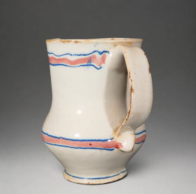 MANISES CERAMICS - Jug with blue and red border decoration