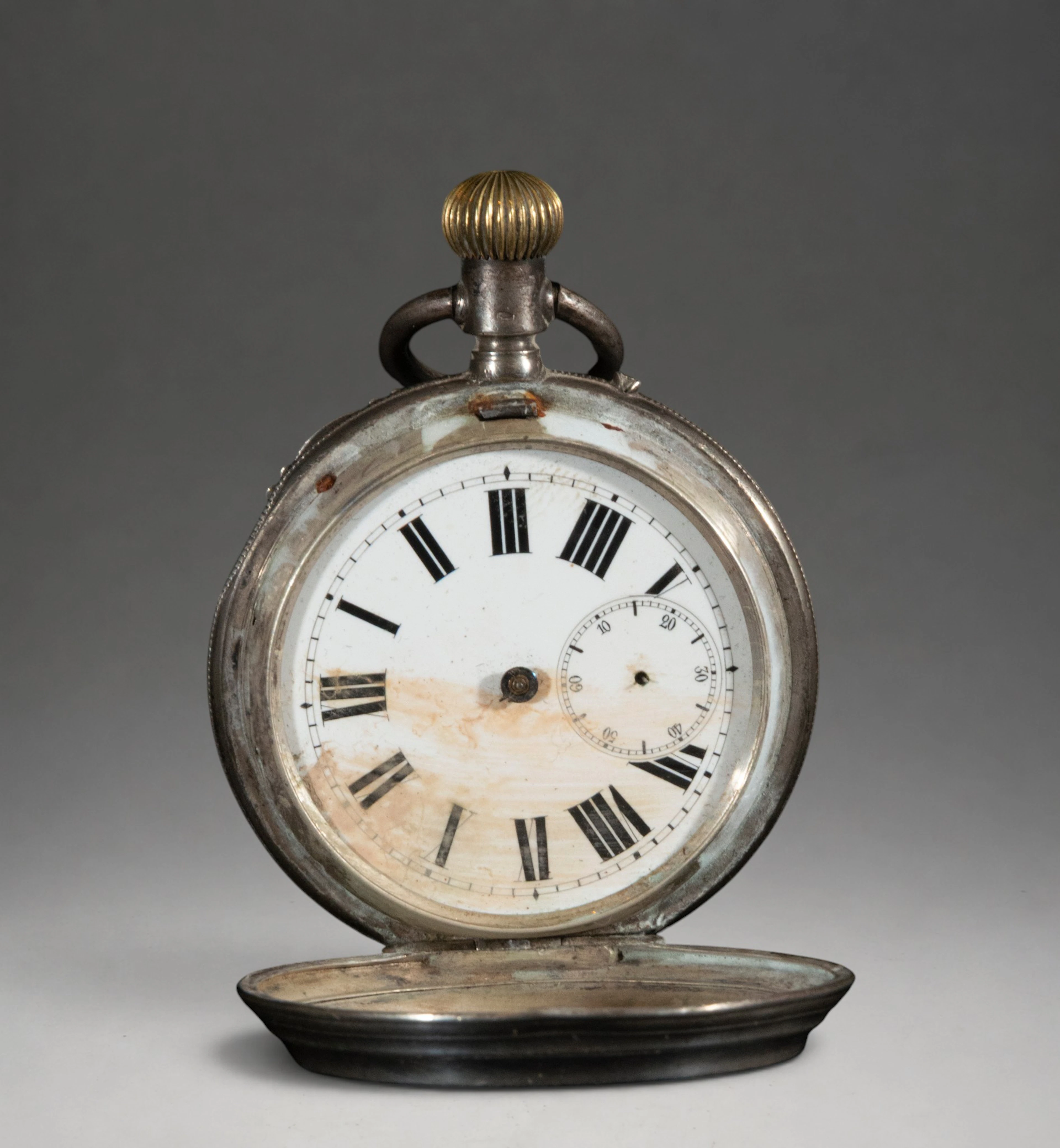 Pocket watch with hinged cover and Roman numeral dial