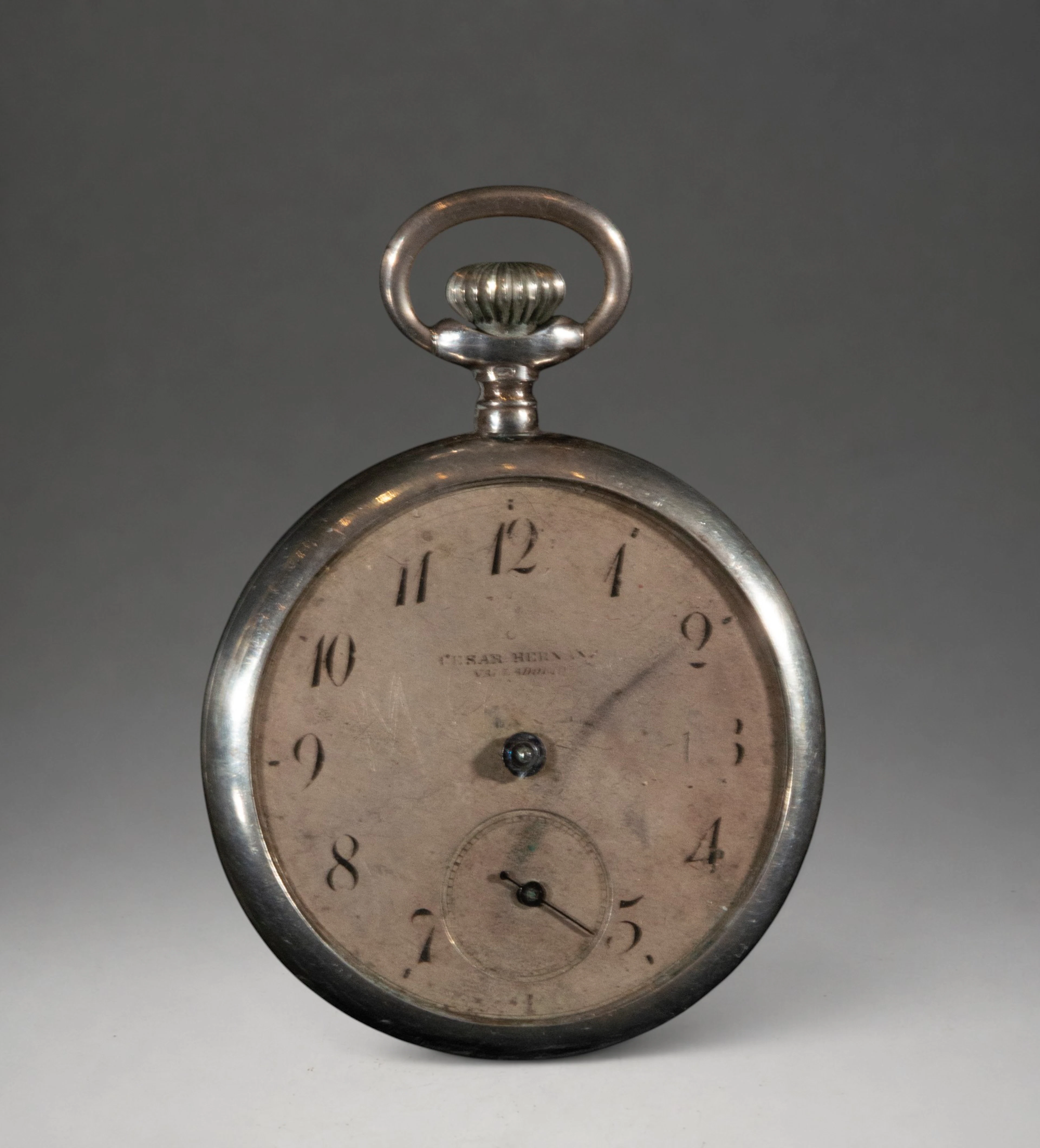 Pocket watch with an ivory-toned dial