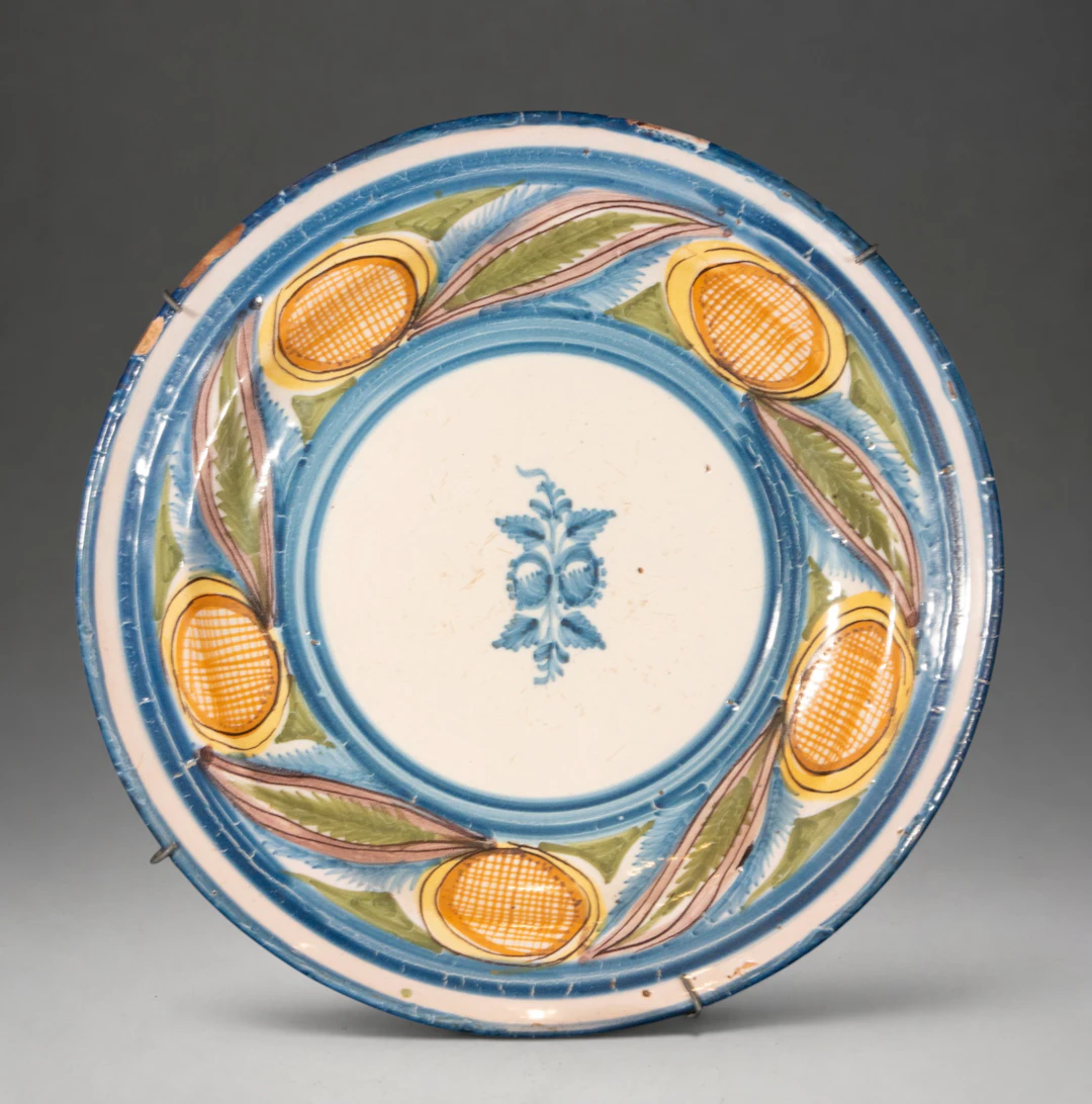 MANISES CERAMICS - Plate with floral decoration and polychrome medallions