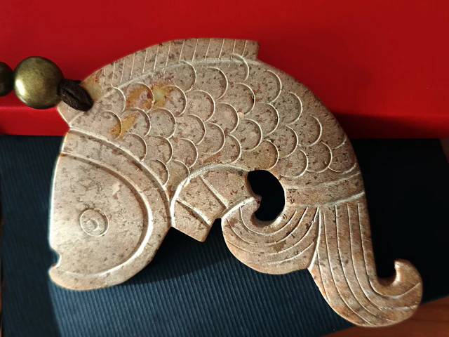 Necklace with enormous carved jade koi fish pendant