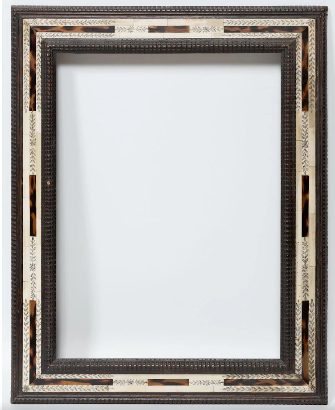 Decorative frame in pyrographic bone, tortoiseshell imitation and