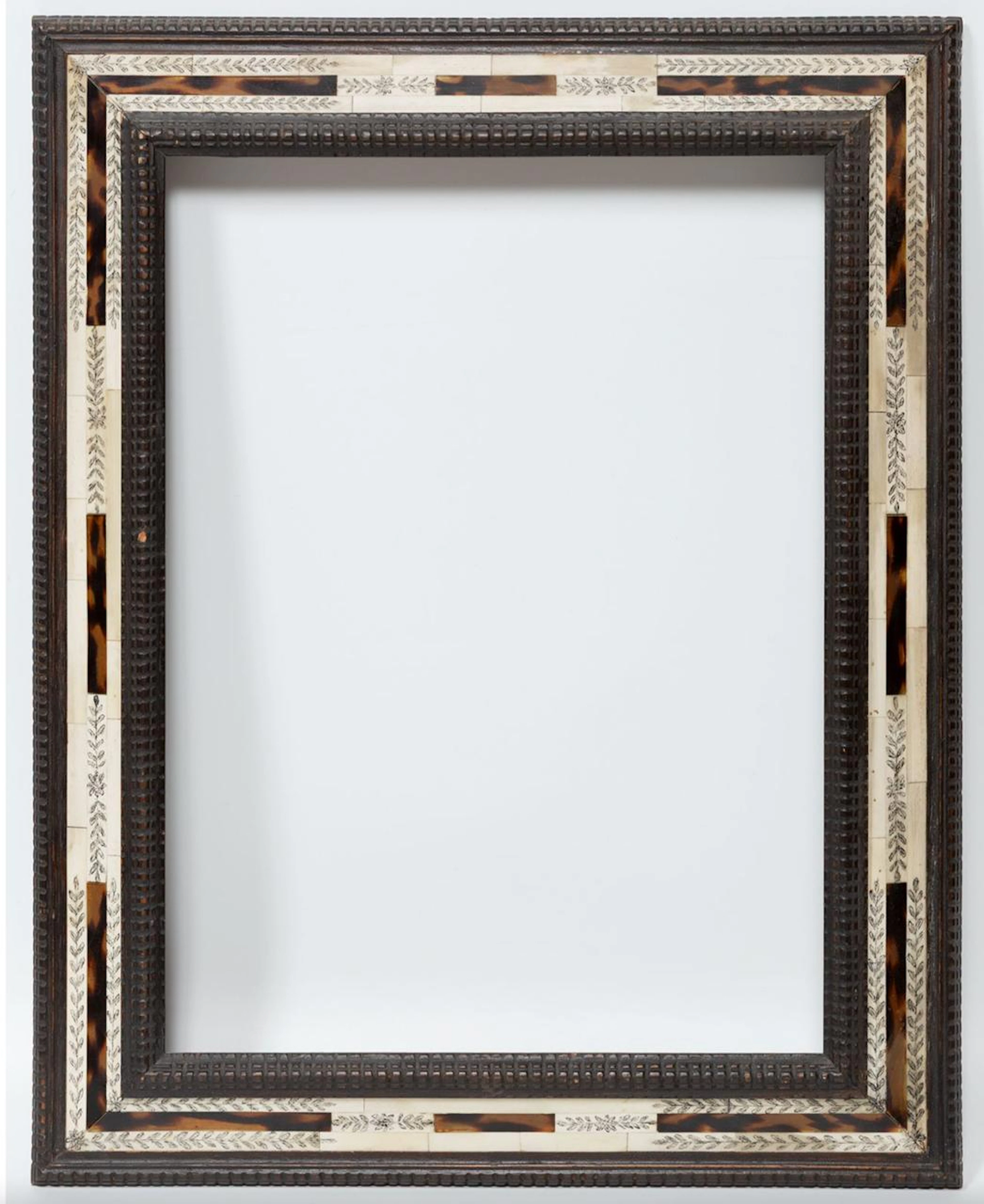 Decorative frame in pyrographic bone, tortoiseshell imitation and