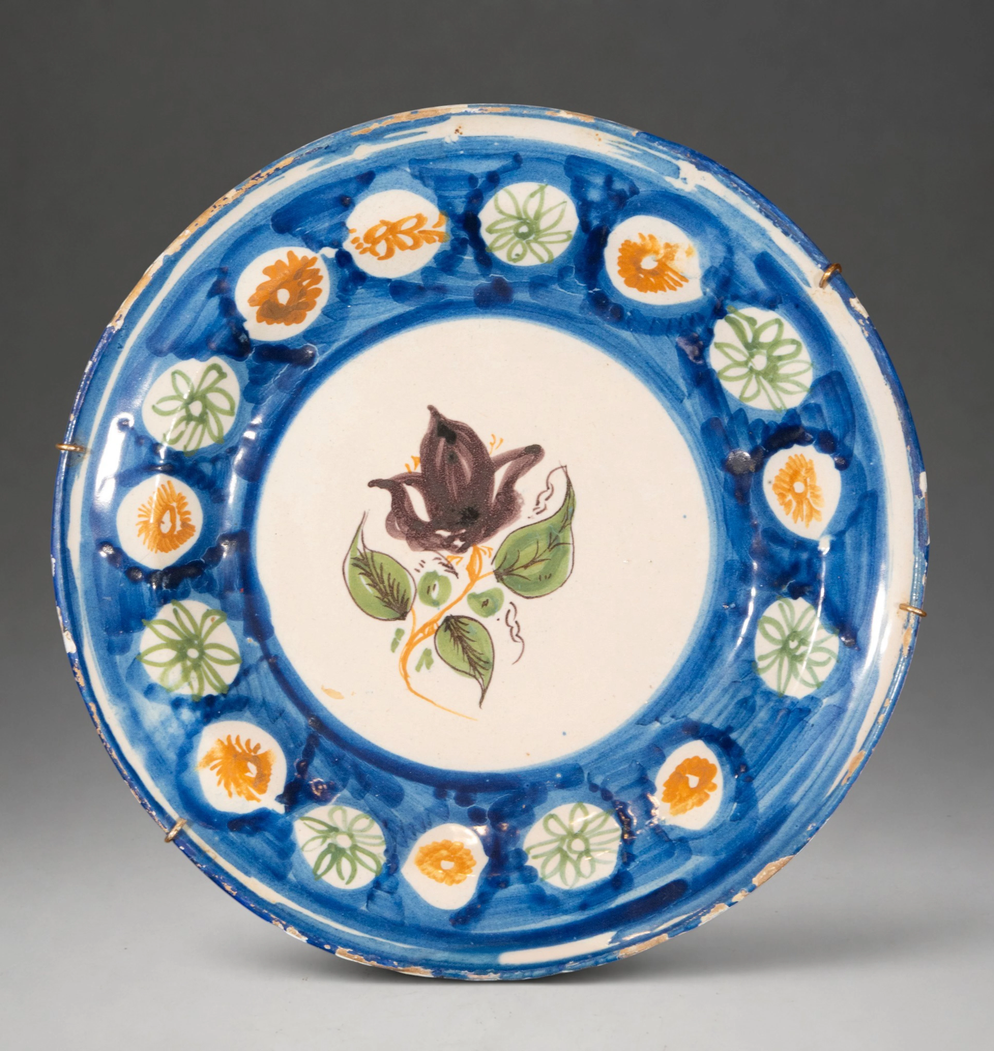 MANISES CERAMICS - Plate with central rose and polychrome floral decoration