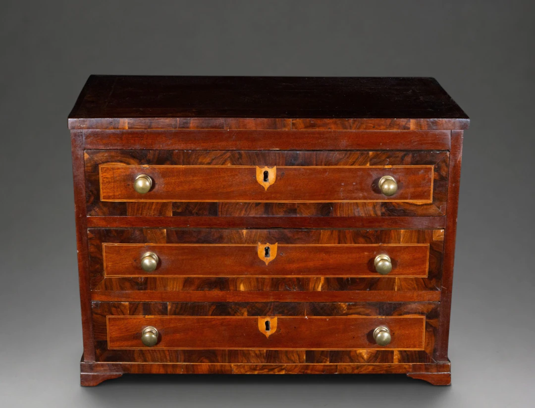 Miniature chest of drawers, possibly a cabinetmaker's work – Charles