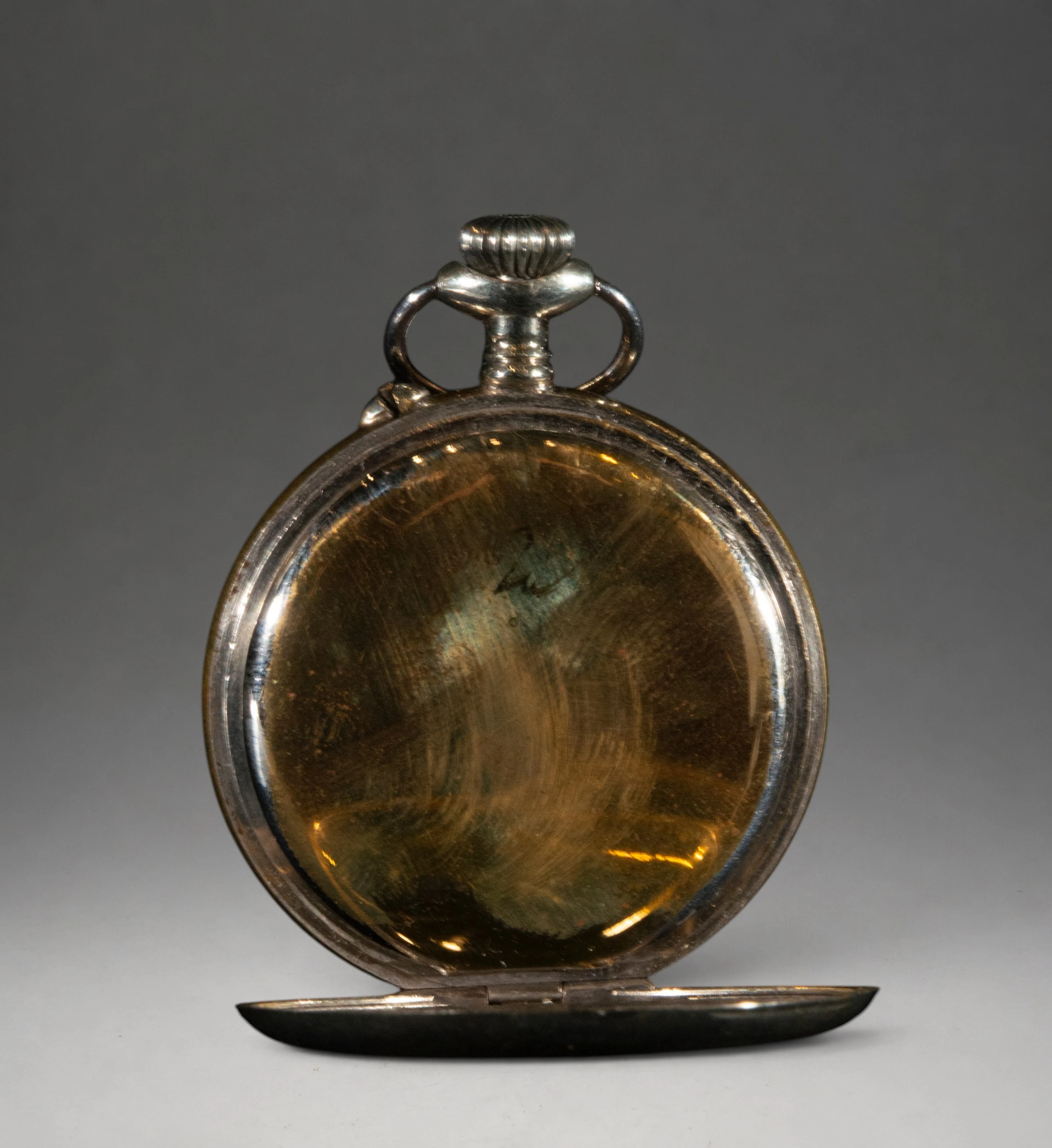 Pocket watch with gold case and hinged lid