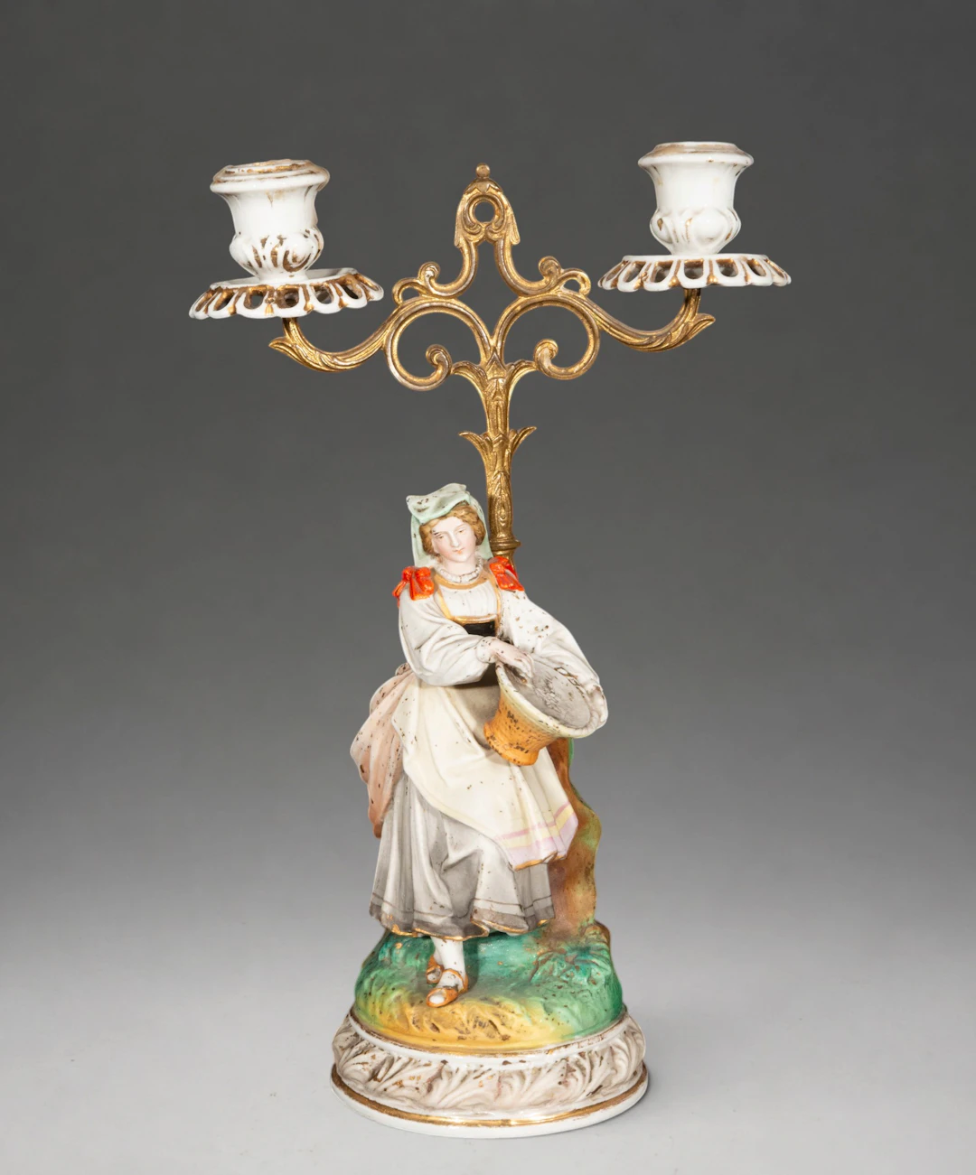 Porcelain candlestick with figure – German School – 19th century