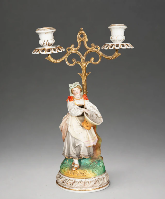 Porcelain candlestick with figure – German School – 19th century