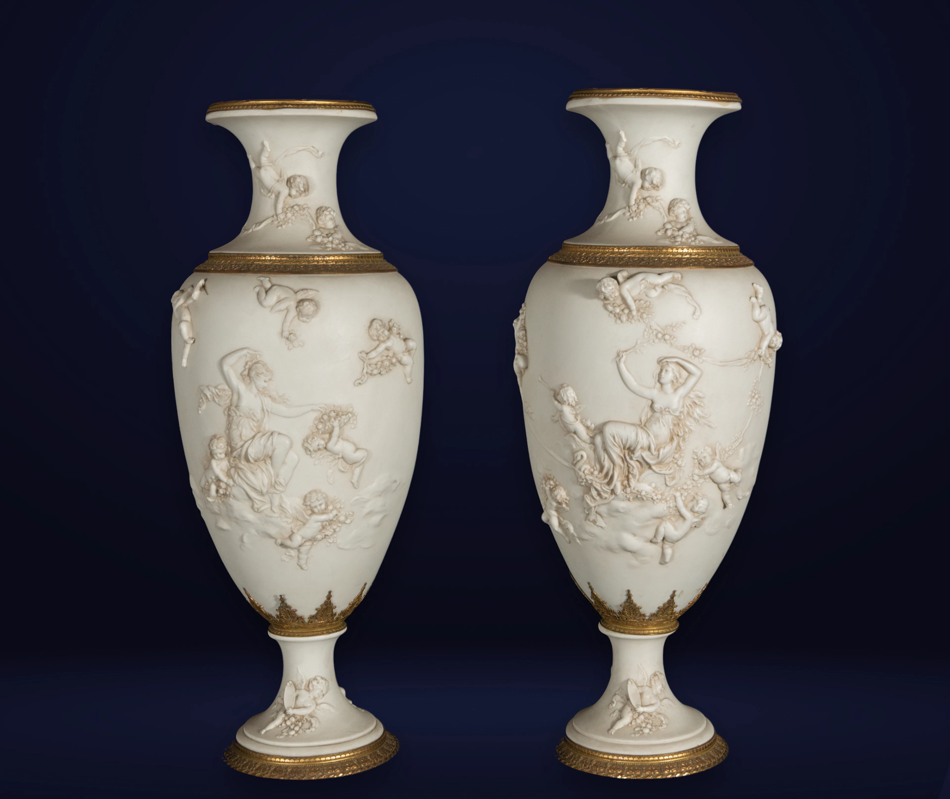 Pair of Sèvres biscuit porcelain vases with gilt bronze from the 19th century