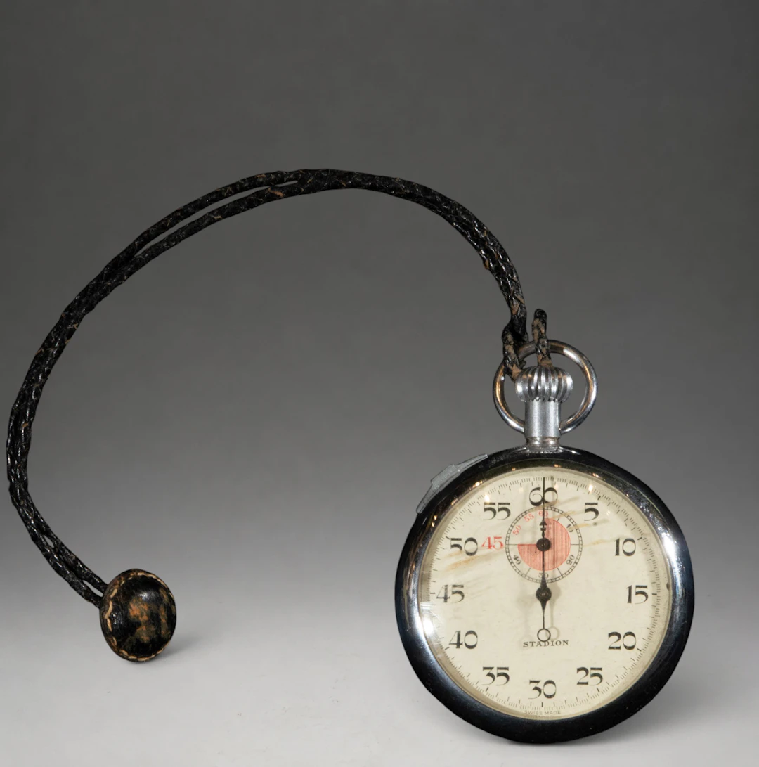 Pendant watch with black cord
