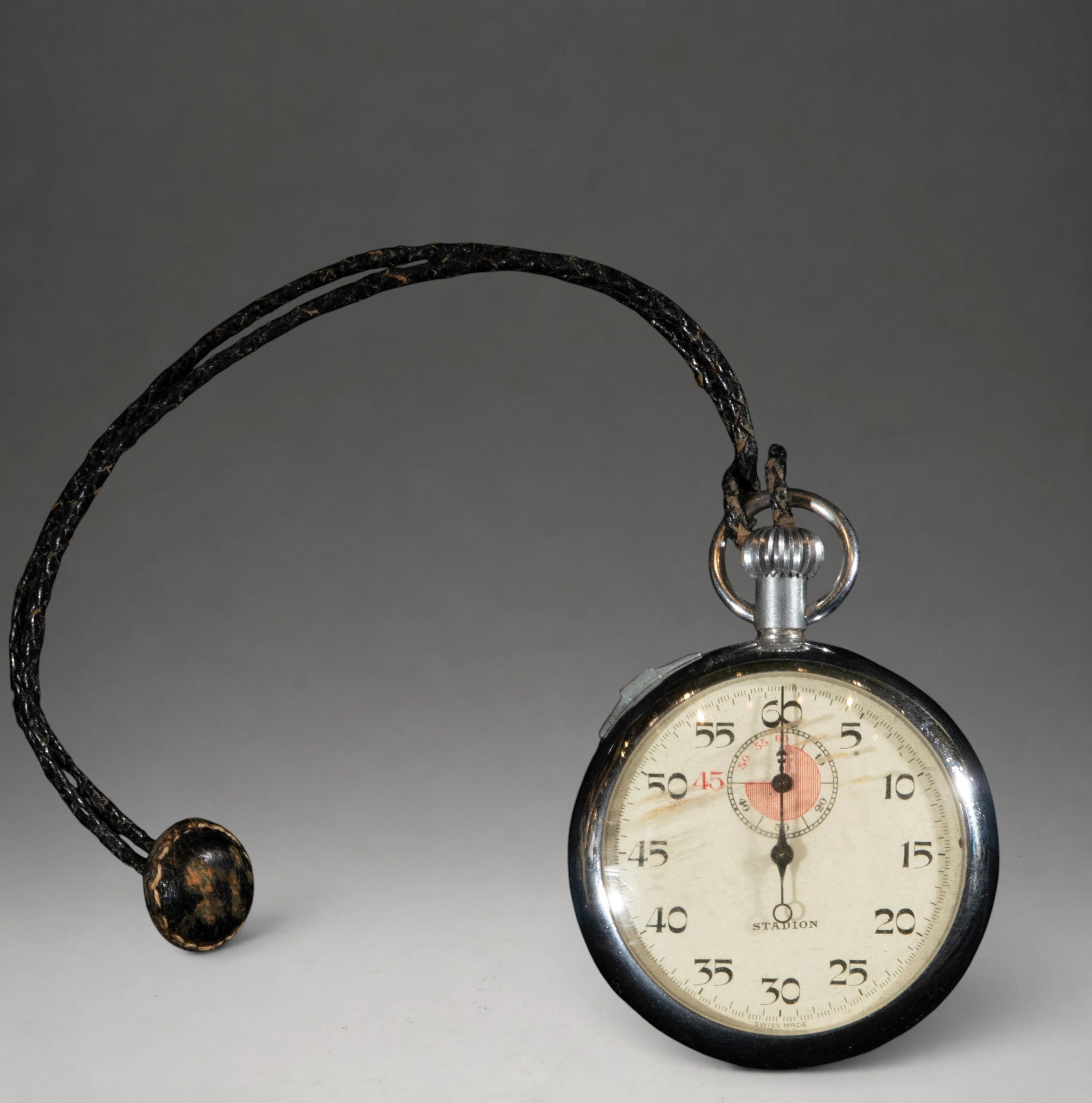Pendant watch with black cord