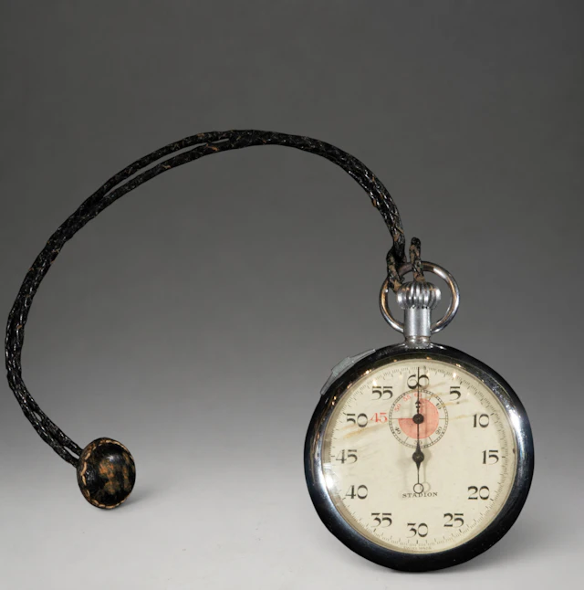 Pendant watch with black cord