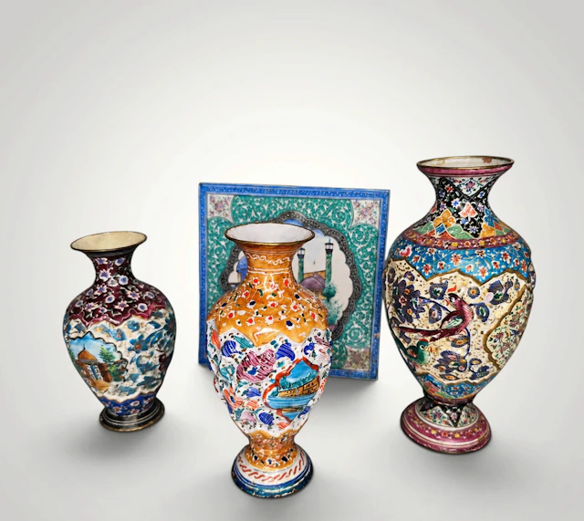 A collection of enameled copper vases - 19th to 20th centuries