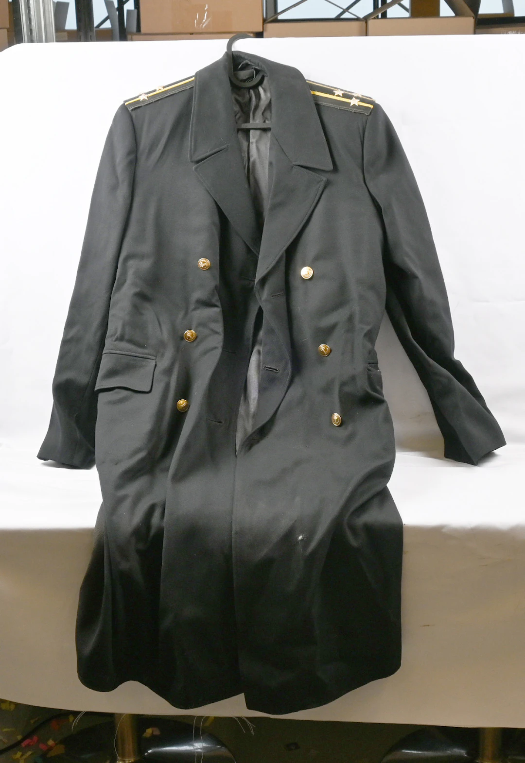 Two Soviet Union era officer overcoats. First is a winter overcoat