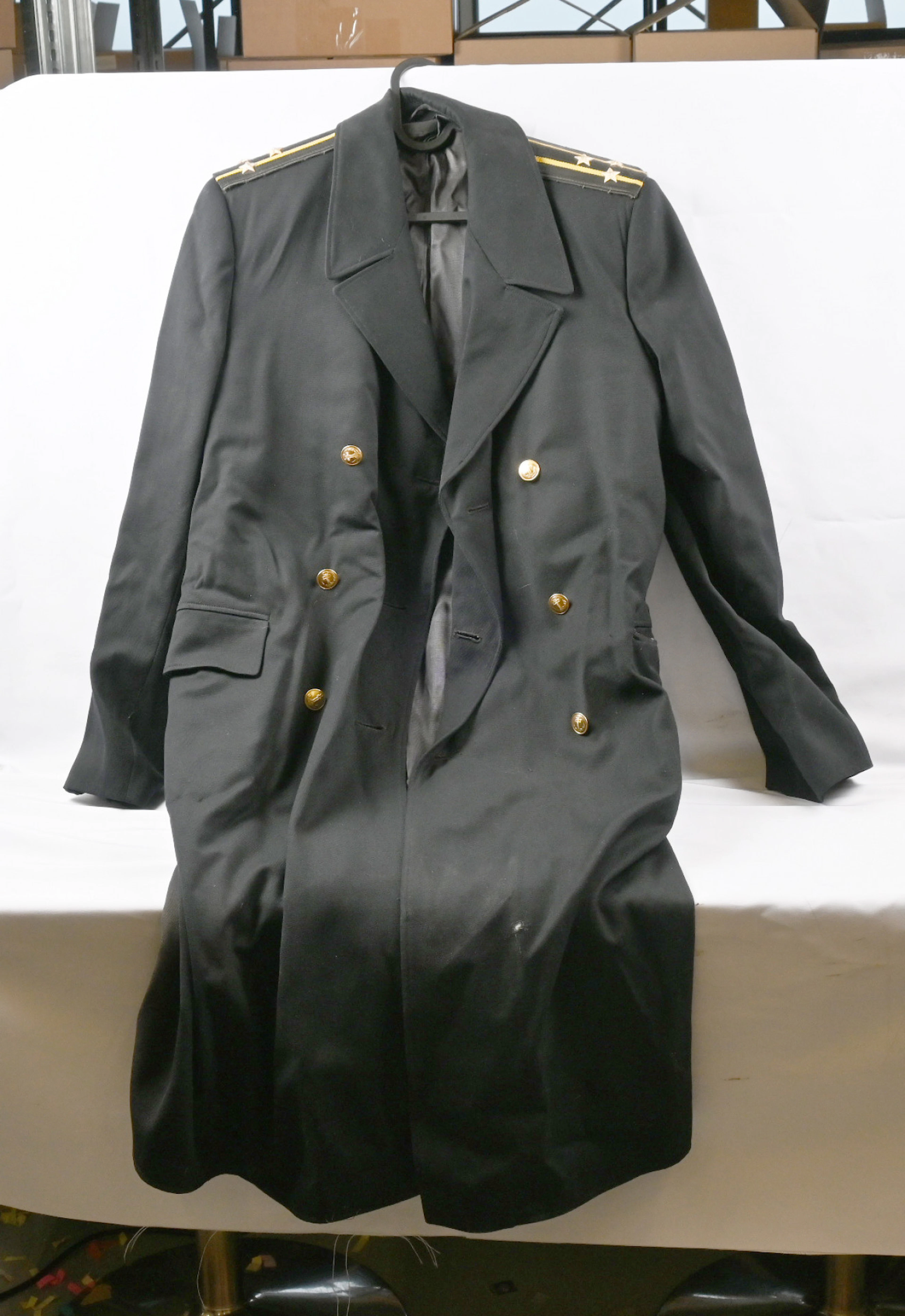 Two Soviet Union era officer overcoats. First is a winter overcoat