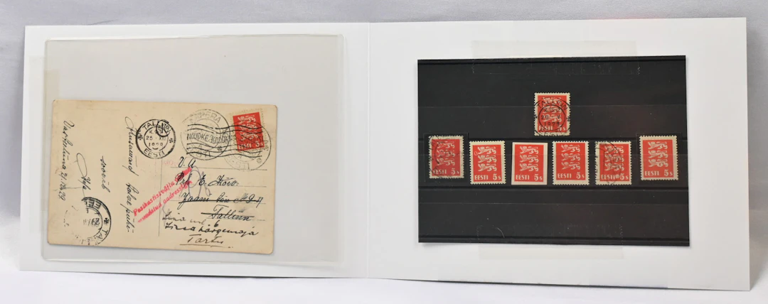 1928 Coat of Arms 5 s red Mi 77, seven stamps as well as a postal